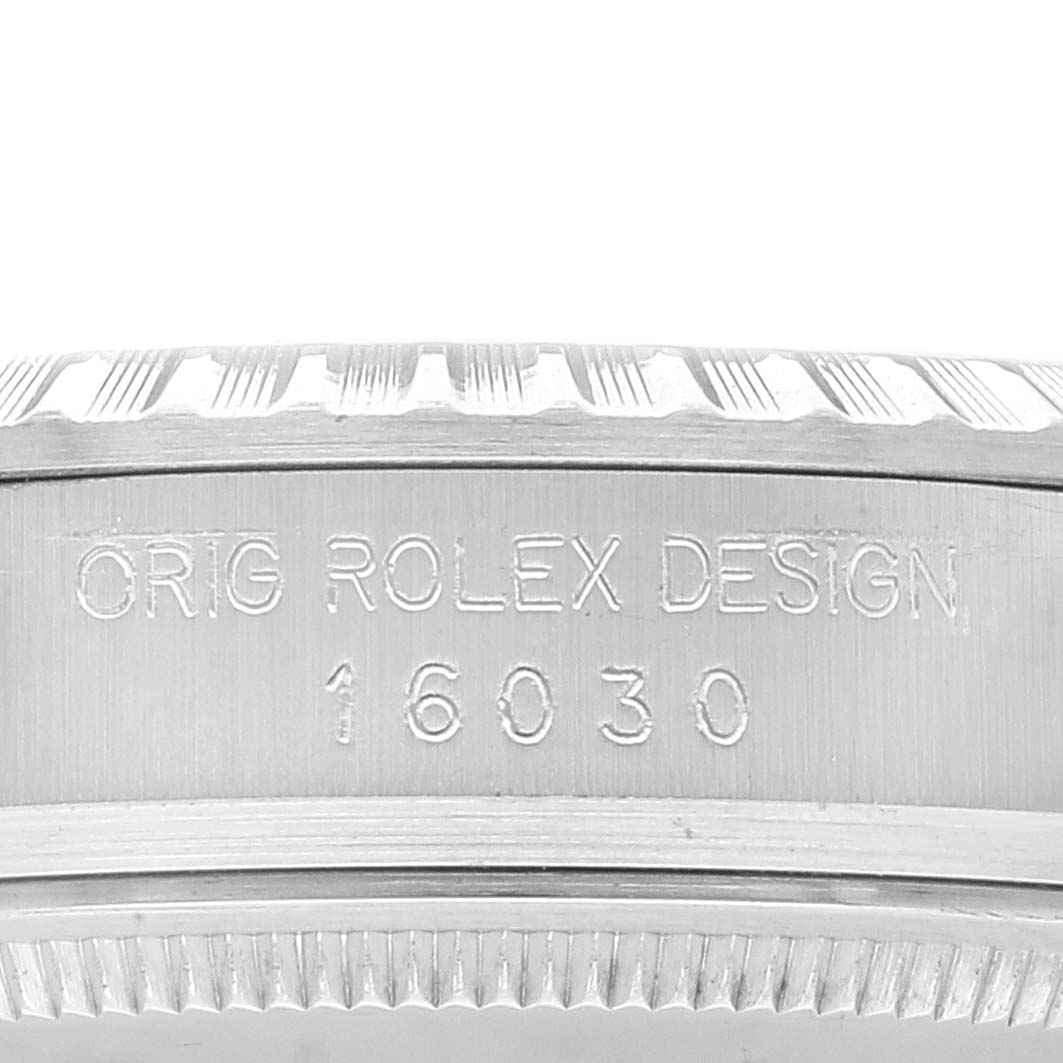 The image shows a close-up of the case side, model number, and bezel of the Rolex Vintage Collection 16030 Men's Stainless Steel Silver Dial 16030 Men's Stainless Steel Silver Dial watch model 16030.