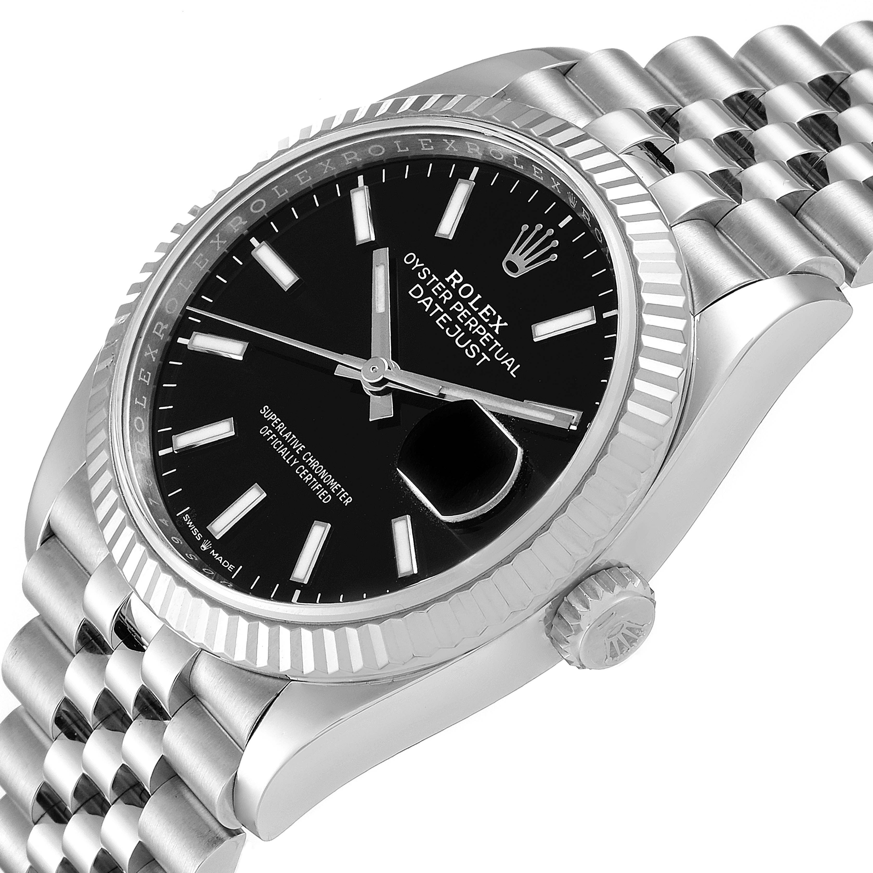 The image shows a close-up of the Rolex Datejust 126234 Men
s Stainless Steel Black Dial 126234 Men
s Stainless Steel Black Dial watch from an angled side view, highlighting the dial, bezel, and bracelet.