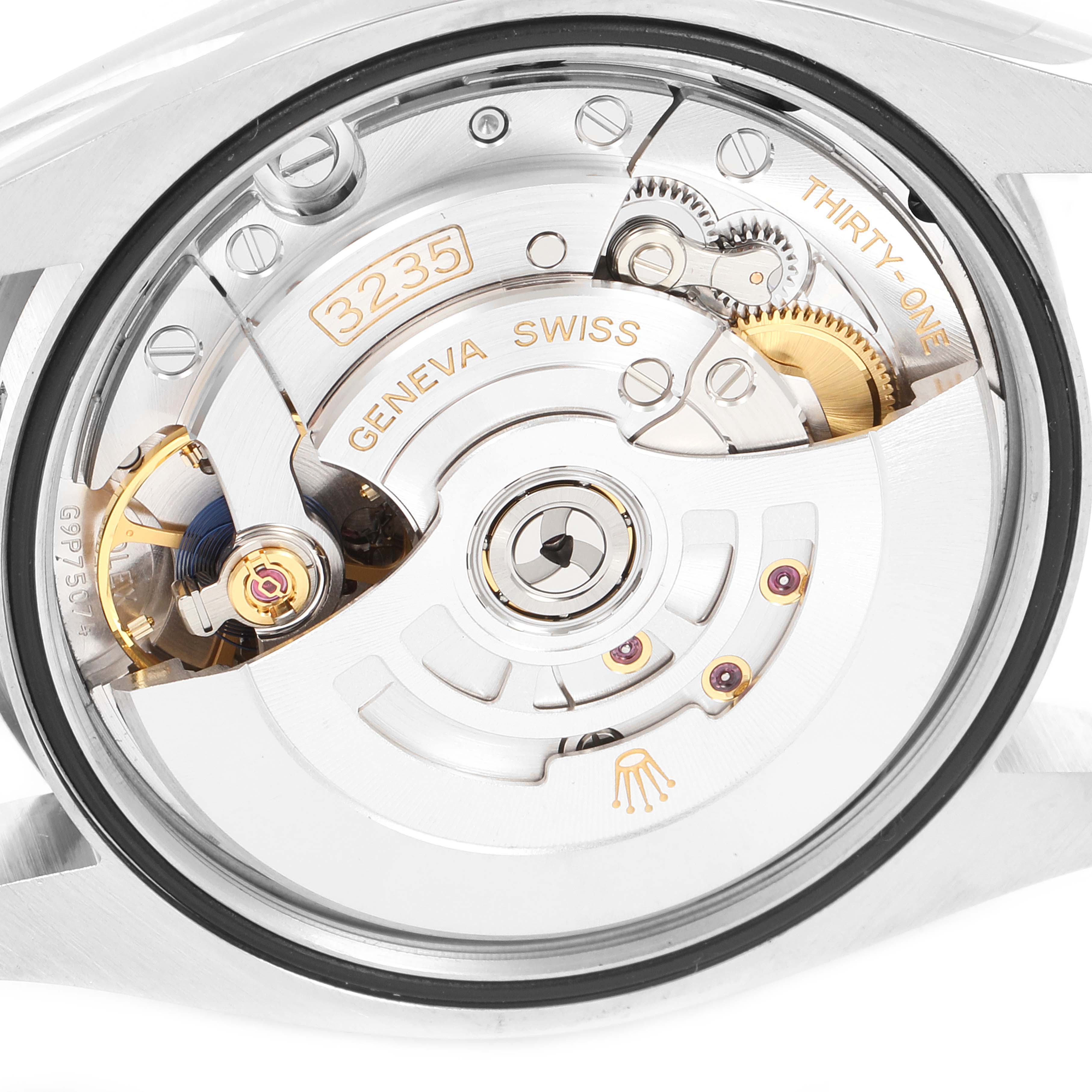 The image shows a close-up view of the movement mechanism in the Rolex Datejust 126234 Men
s Stainless Steel Black Dial 126234 Men
s Stainless Steel Black Dial watch, specifically the caliber 3235.