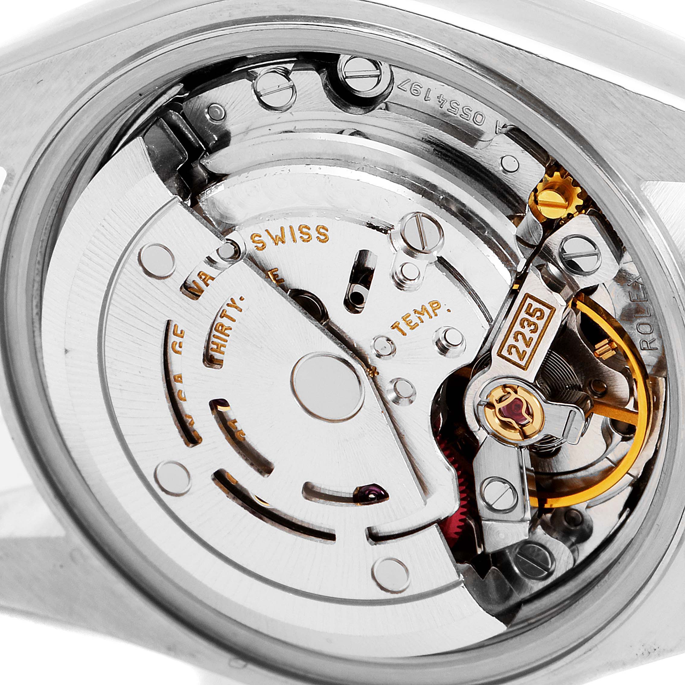 The image shows a close-up of the internal movement mechanism of a Rolex Datejust 79174 Women
s Stainless Steel Silver Dial 79174 Women
s Stainless Steel Silver Dial watch.