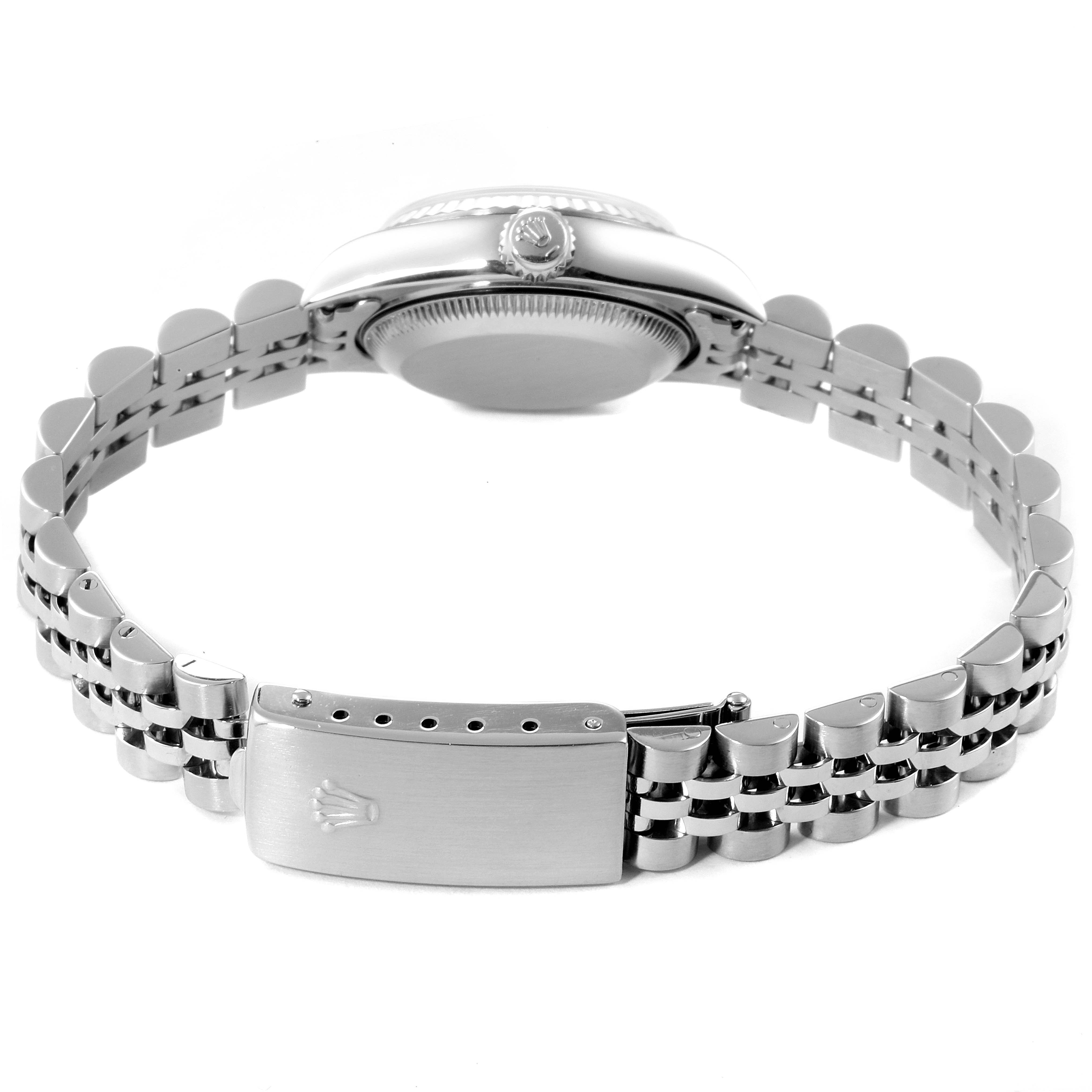 This image shows the Rolex Datejust 79174 Women
s Stainless Steel Silver Dial 79174 Women
s Stainless Steel Silver Dial watch from the back, highlighting the case, bezel, crown, and bracelet clasp.