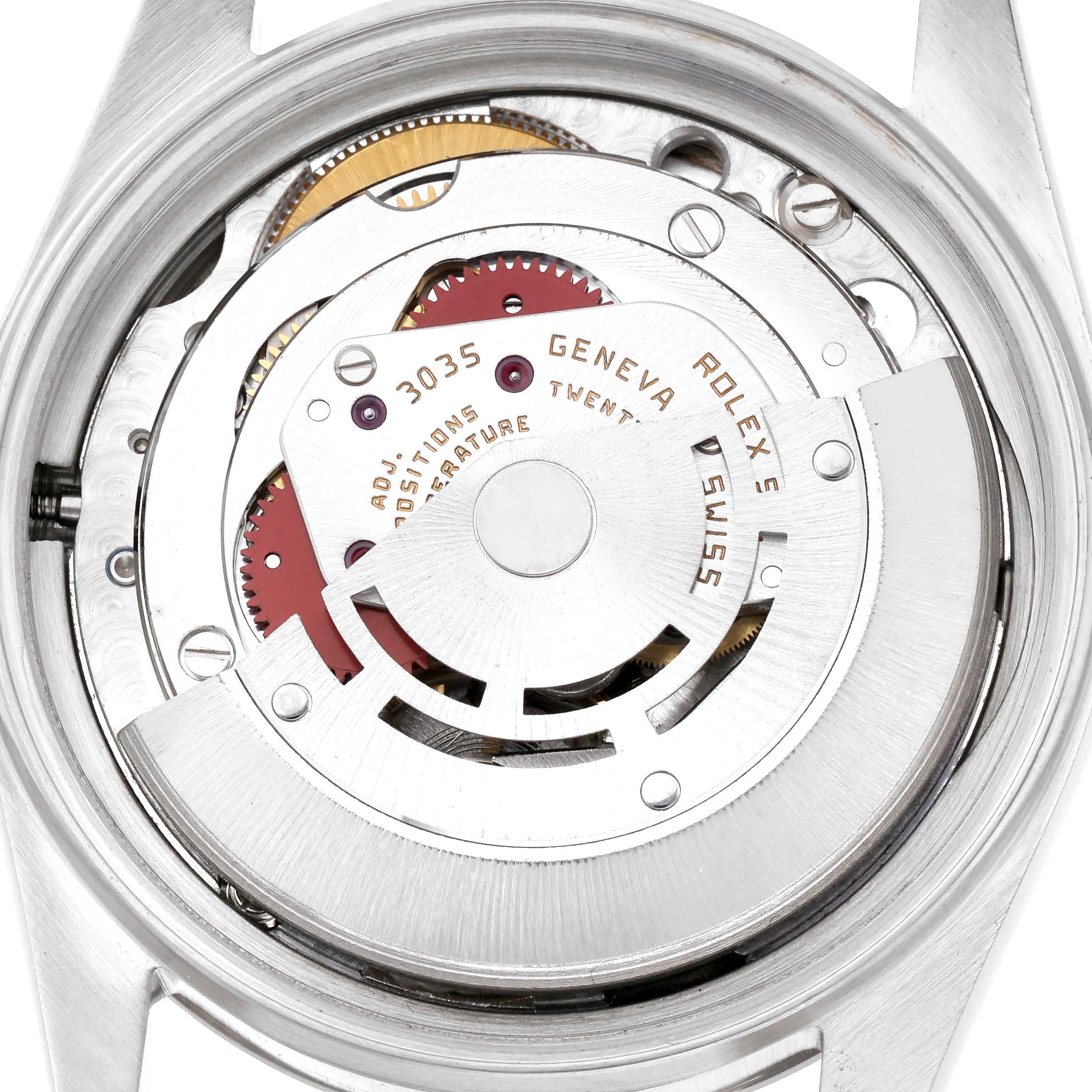 The image shows the inner movement of a Rolex Vintage Collection model, model number 16014, focusing on the mechanical components and rotor.