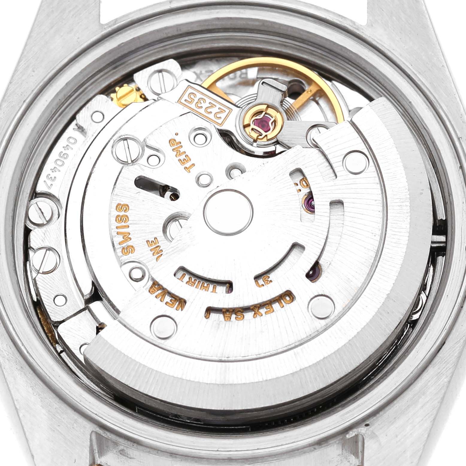 The image shows the movement of the Rolex Datejust 79173 Women's Stainless Steel Champagne Dial, focusing on the rotor and internal components.