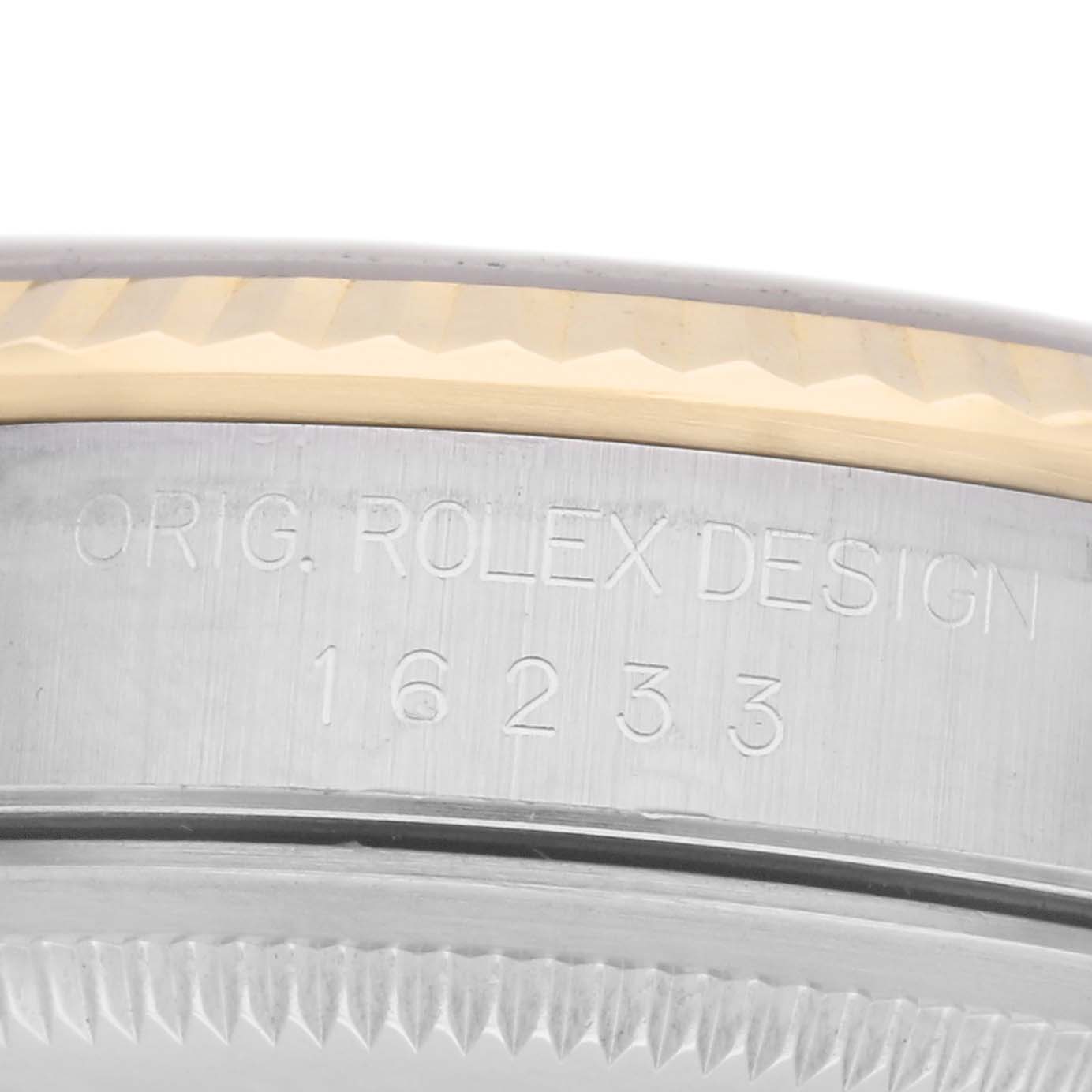 The image shows a close-up of the side of a Rolex Datejust model 16233, highlighting the edge of the case and the model number engraving.