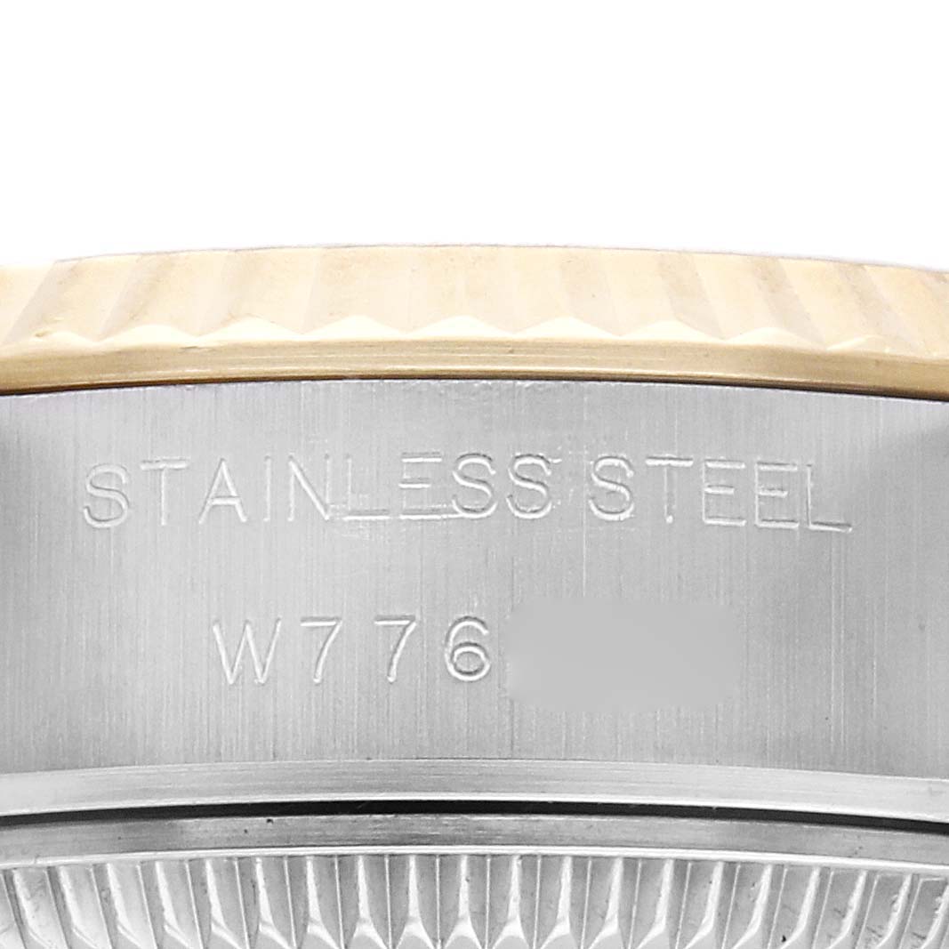 The image shows the side view of the Rolex Datejust model 69173, featuring the engraving "STAINLESS STEEL" and part of the bezel design.