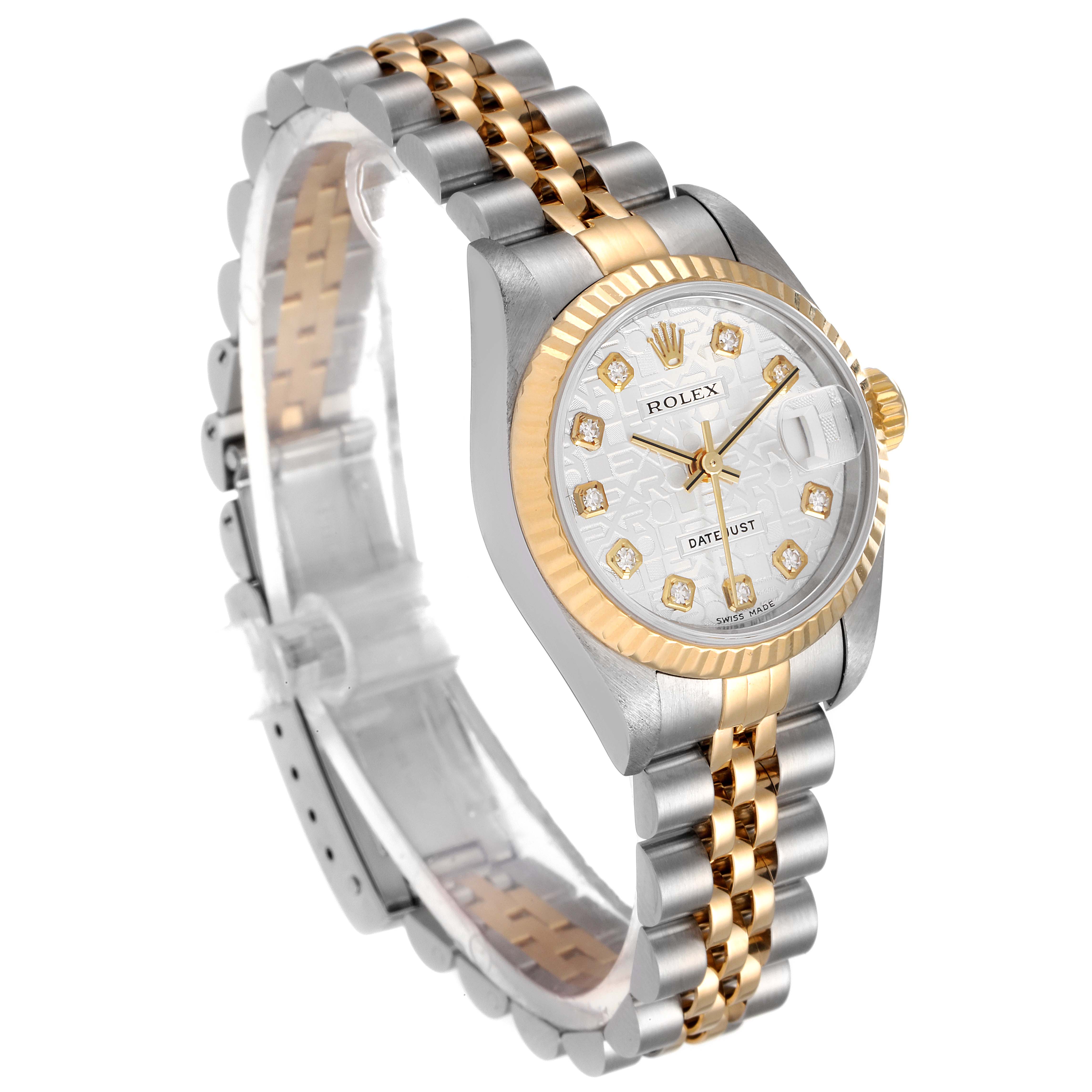 The Rolex Datejust 79173 Women
s Steel and Gold (two tone) Silver Dial 79173 Women
s Steel and Gold (two tone) Silver Dial watch is shown from a three-quarter angle, highlighting the face, bezel, and two-tone bracelet.