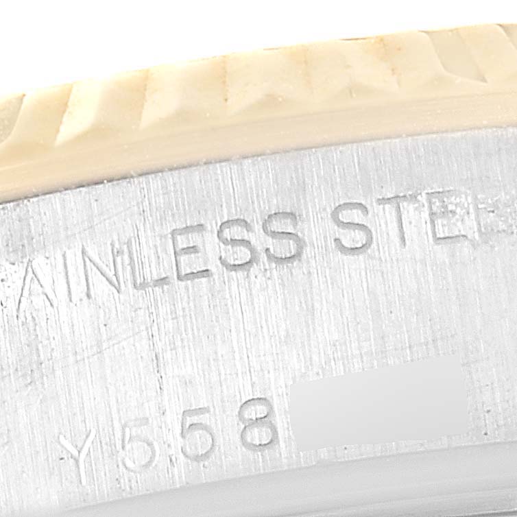 This close-up image shows the stainless steel caseback edge and partial bezel of the Rolex Datejust 79173 Women
s Steel and Gold (two tone) Grey Dial 79173 Women
s Steel and Gold (two tone) Grey Dial model.