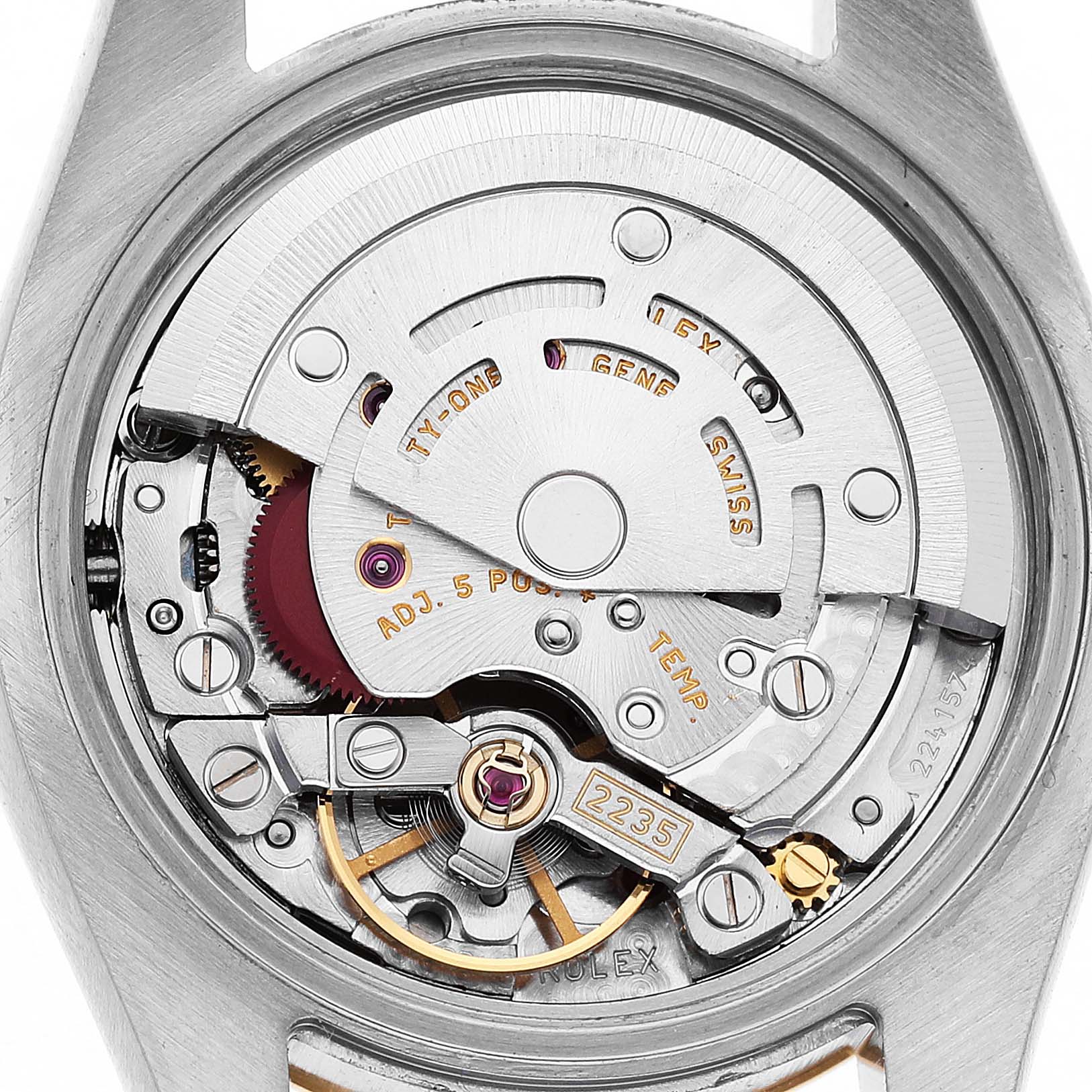 The image shows the movement mechanism of a Rolex Datejust 179173 Women's Steel and Gold (two tone) White Dial watch from the back, highlighting its intricate components.