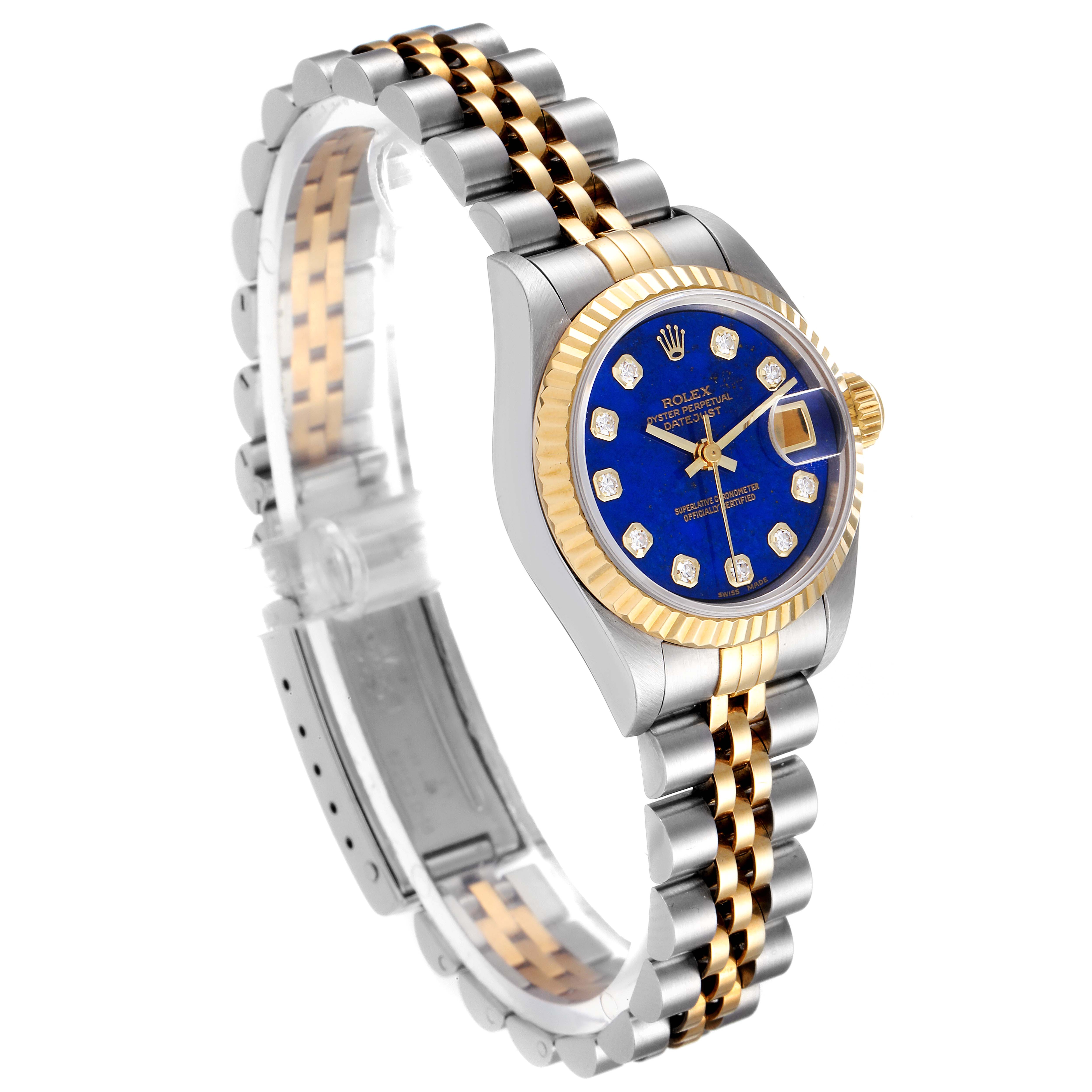 The Rolex Datejust 69173 Women's Steel and Gold (two tone) Blue Dial 69173 Women's Steel and Gold (two tone) Blue Dial watch is shown at an angled view, highlighting its blue dial, two-tone bracelet, and fluted bezel.