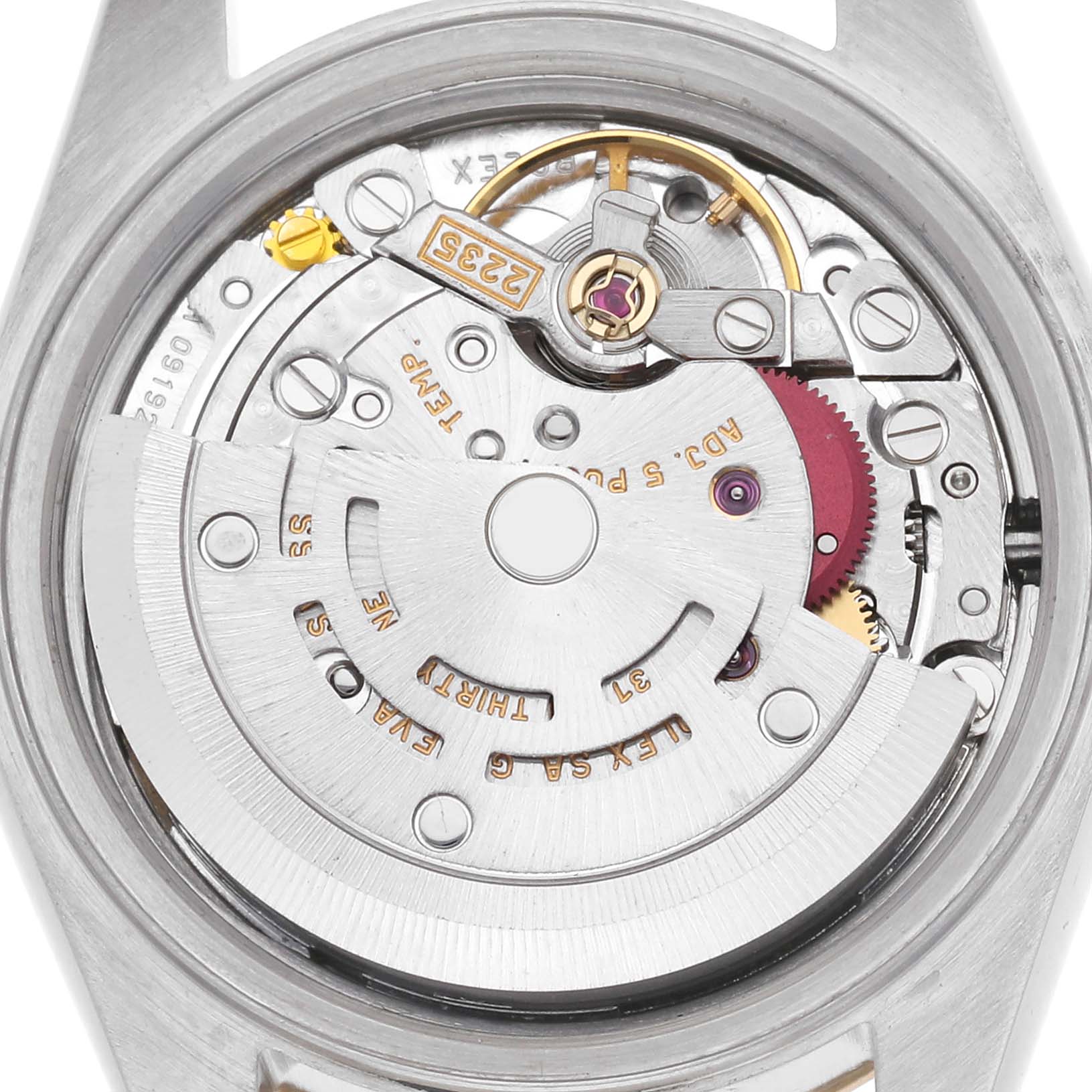 The image shows the movement of a Rolex Datejust model 79173, capturing the intricate mechanical components from the back.