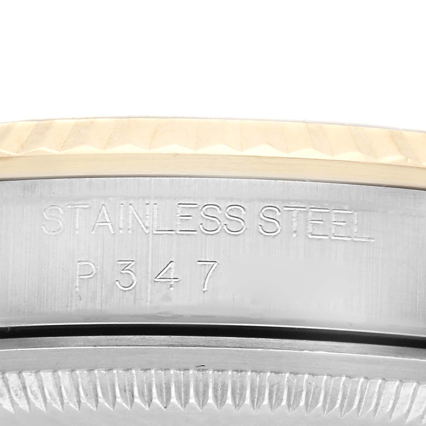 The image shows a close-up side view of the Rolex Datejust model 16233, highlighting the stainless steel engraving on the watch case.