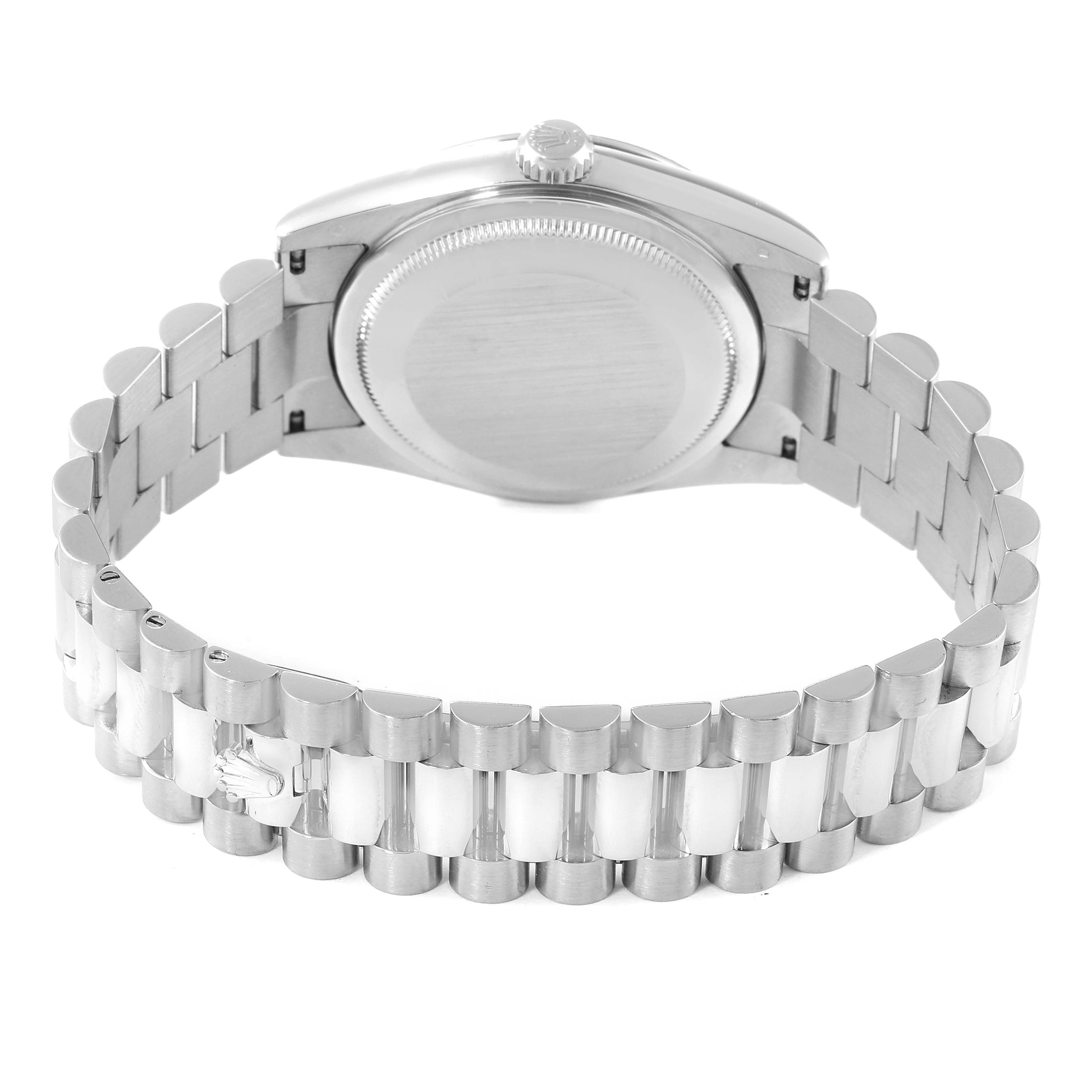 The Rolex President 118239 Men's White Gold Silver Dial 118239 Men's White Gold Silver Dial model watch is shown from the back, highlighting its bracelet and caseback.