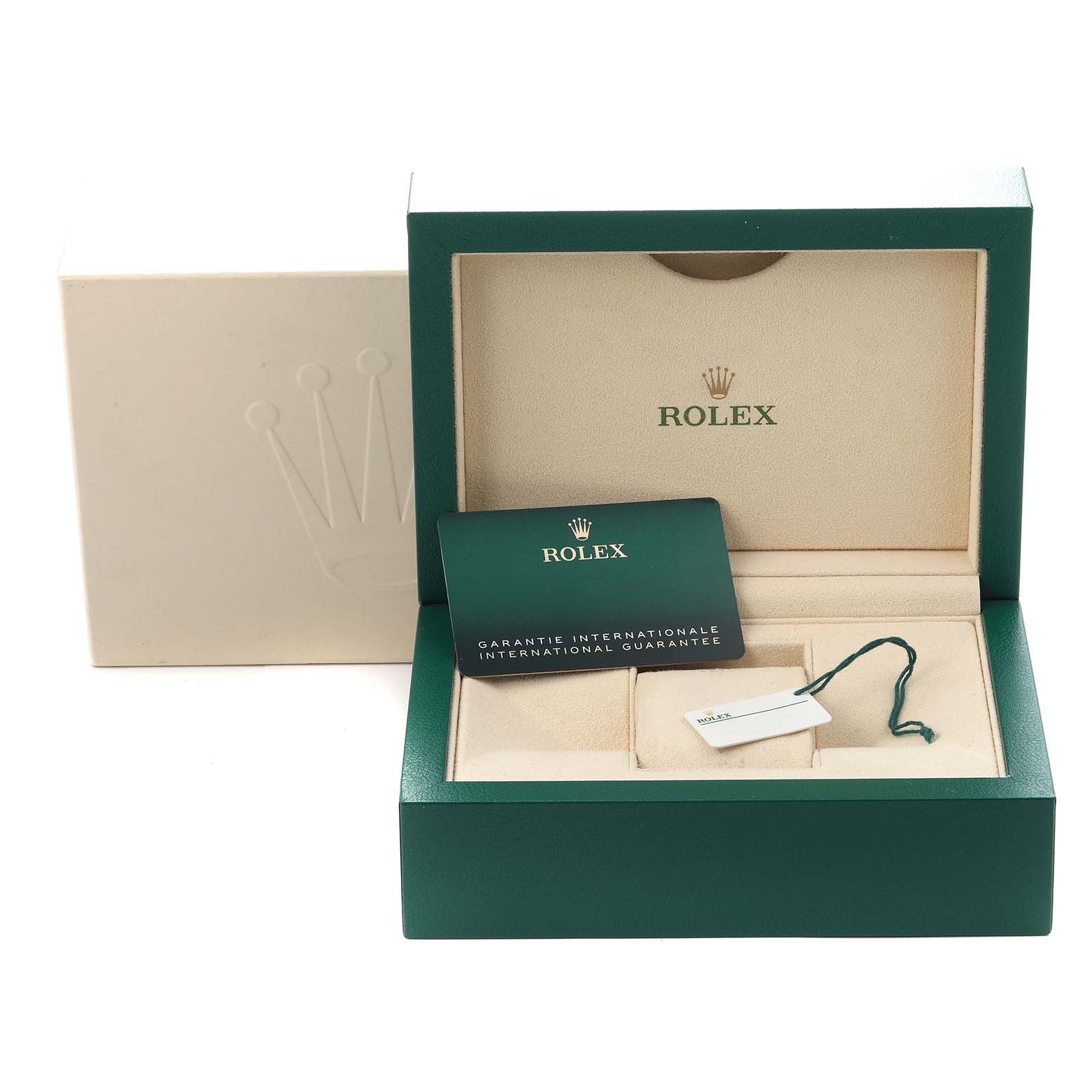 The image displays an open Rolex Daytona model 116508 box, with an international guarantee card and a tag visible inside.