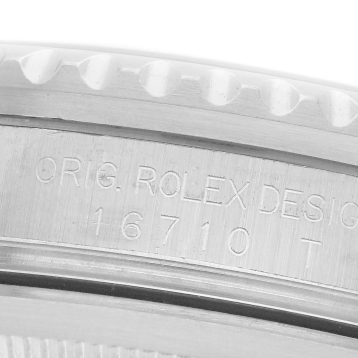 The image showcases an angled close-up of the side engraving on the case of a Rolex GMT-Master model 16710 men's watch, displaying the model number.