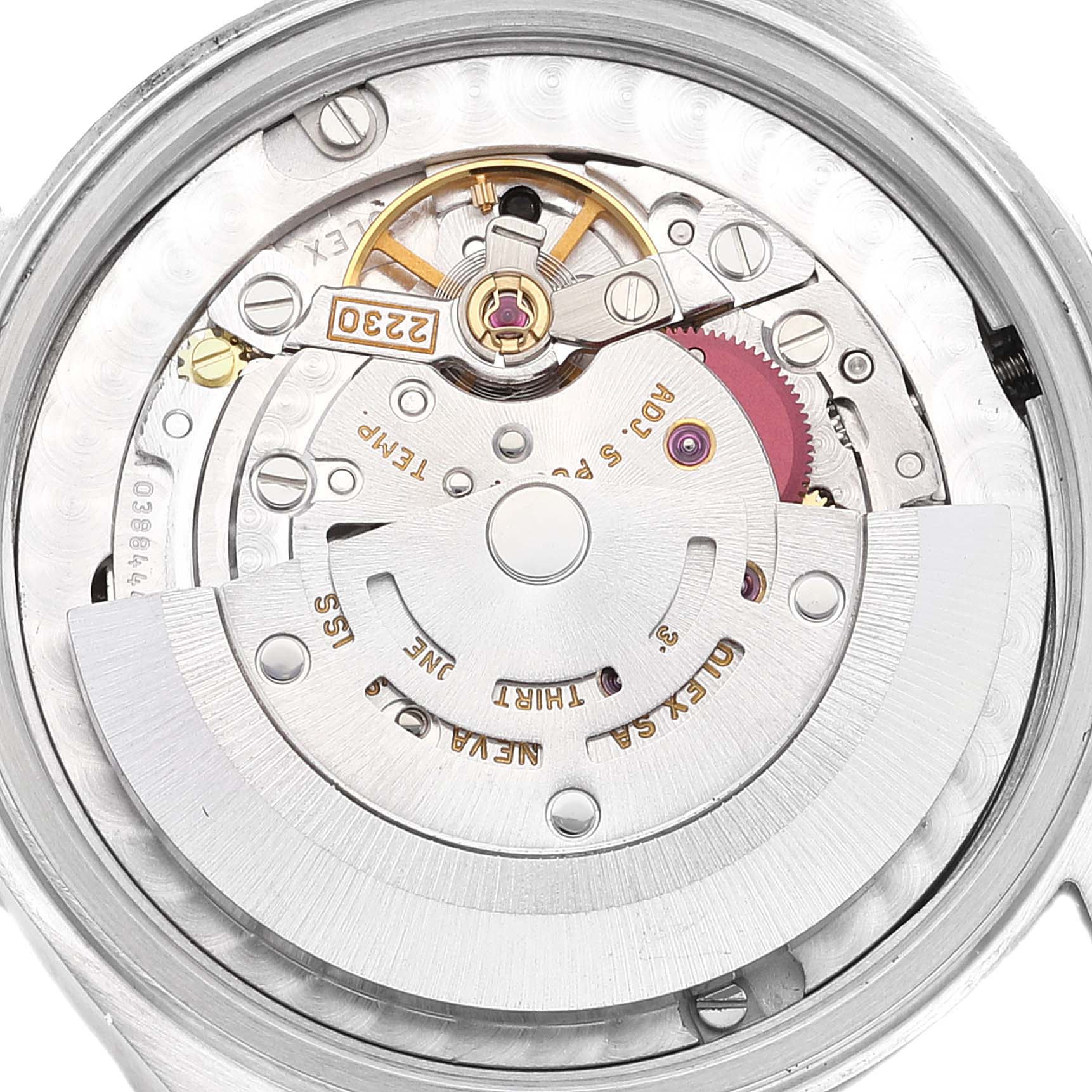 The image shows a close-up view of the internal mechanical movement of a mid-size Rolex watch.