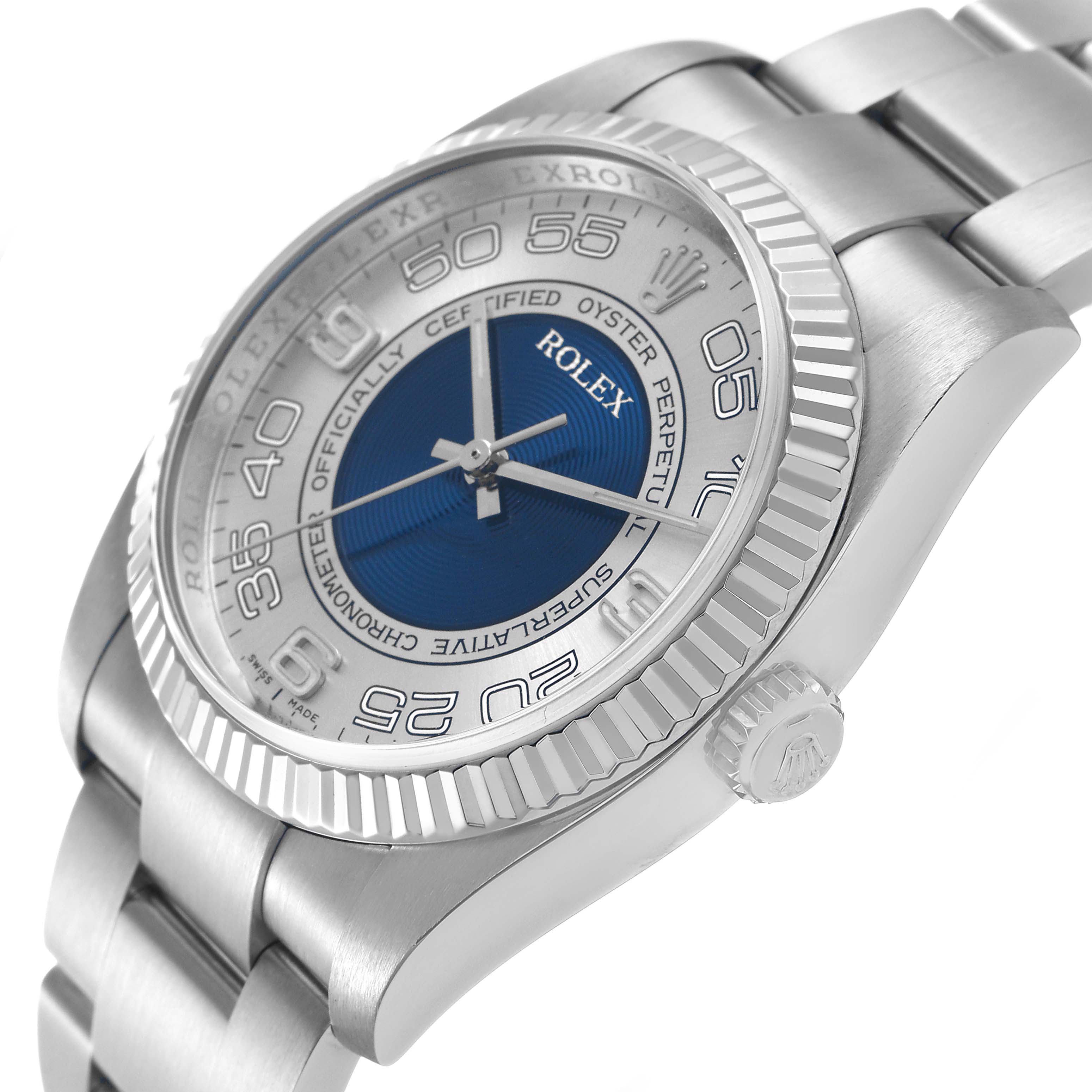 The Rolex Oyster Perpetual 116034 Men's Stainless Steel Blue Dial watch is shown from an angled side view, highlighting the bezel, dial, and bracelet.