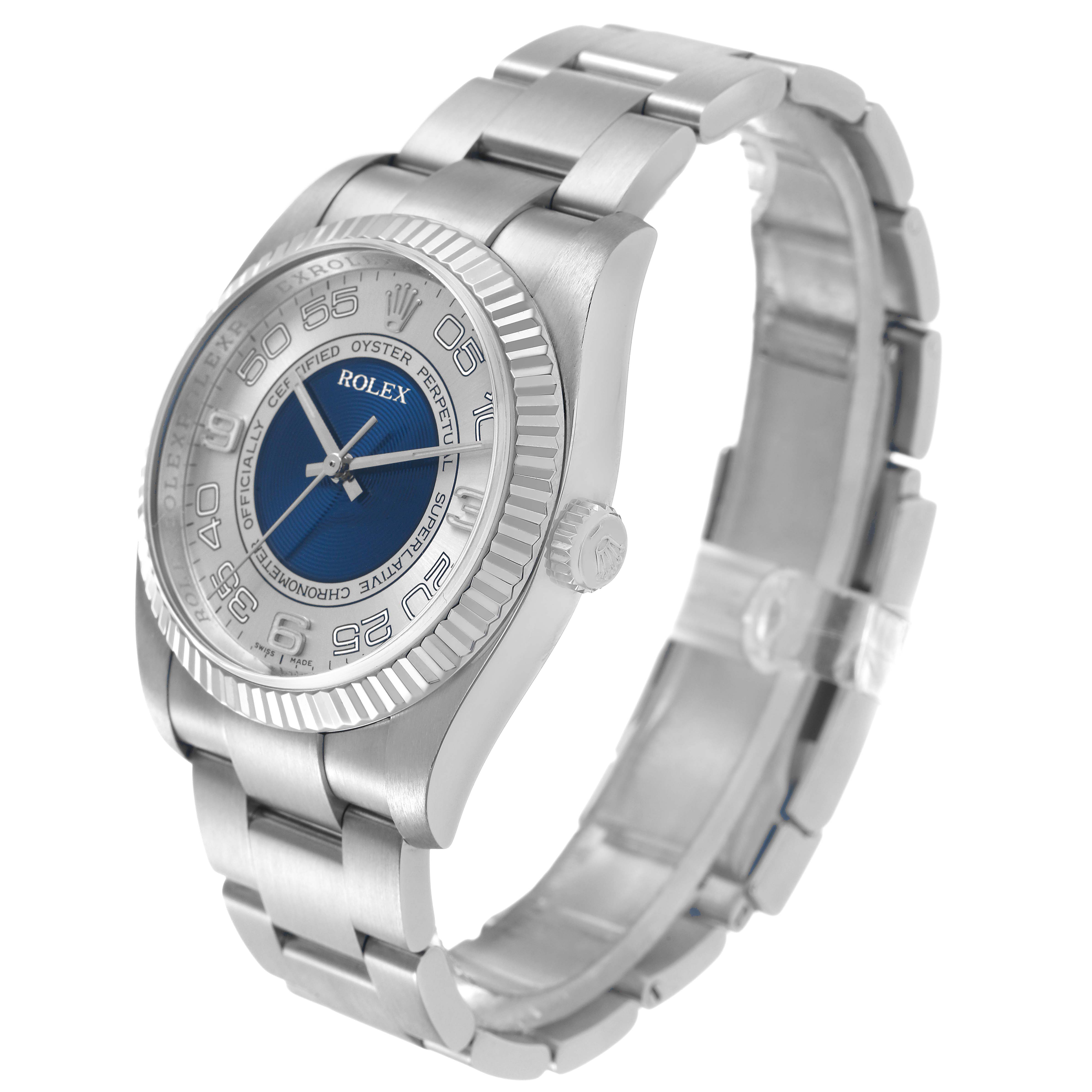 The Rolex Oyster Perpetual 116034 Men's Stainless Steel Blue Dial watch is shown at a three-quarter angle highlighting the dial, bezel, case, and bracelet.