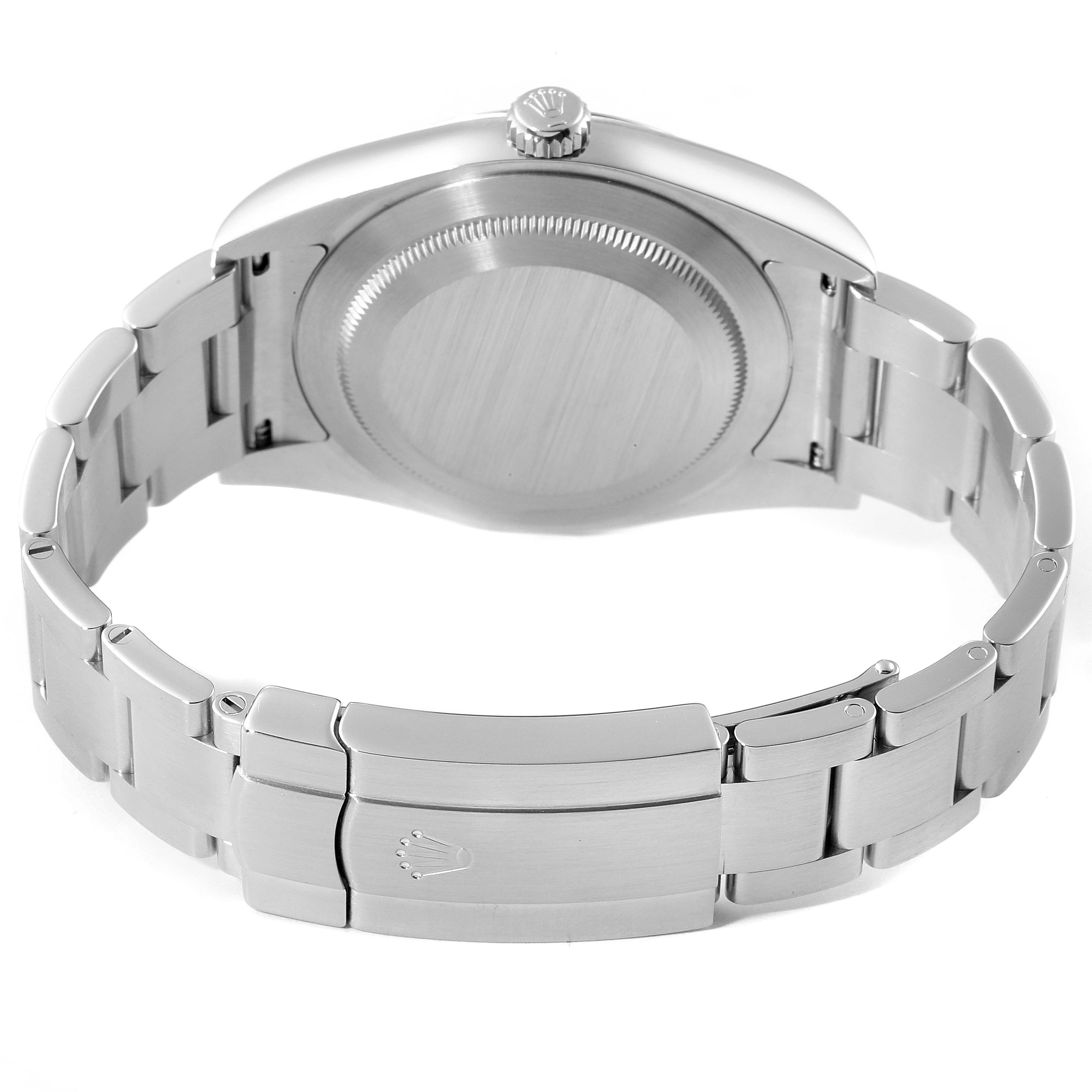 The image shows the back and clasp of a Rolex Oyster Perpetual 114300 Men's Stainless Steel Silver Dial 114300 Men's Stainless Steel Silver Dial watch, offering a clear view of the bracelet and case back.