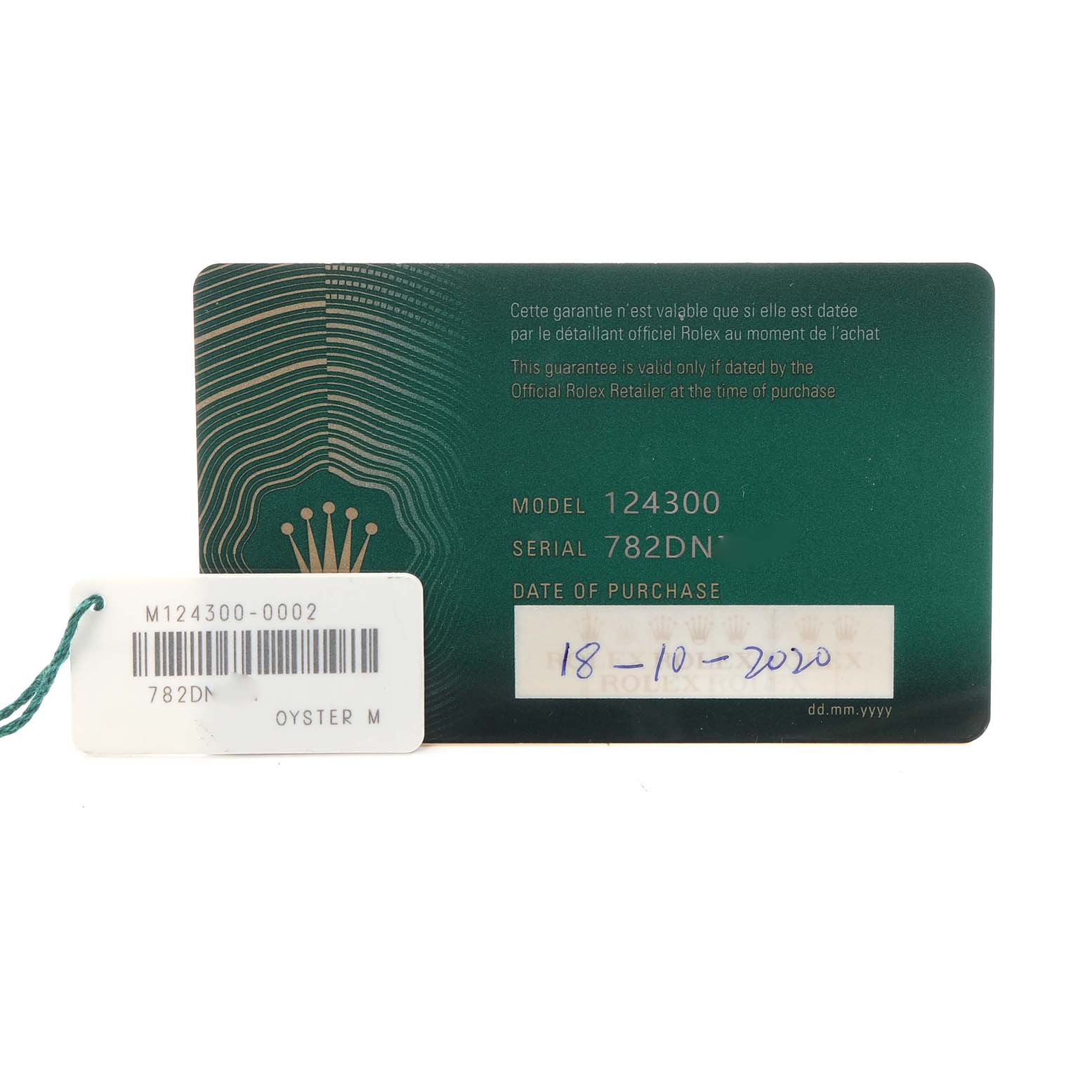 The image shows the warranty card and tag for a Rolex Oyster Perpetual, model number 124300, with information like serial number and purchase date visible.
