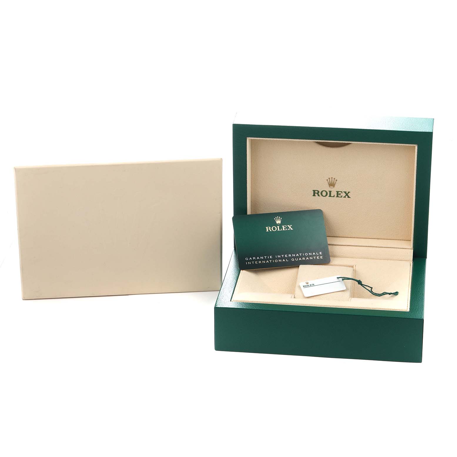 The image shows a Rolex Oyster Perpetual model 124300 watch box, warranty card, and tag, photographed from the front at an angle.