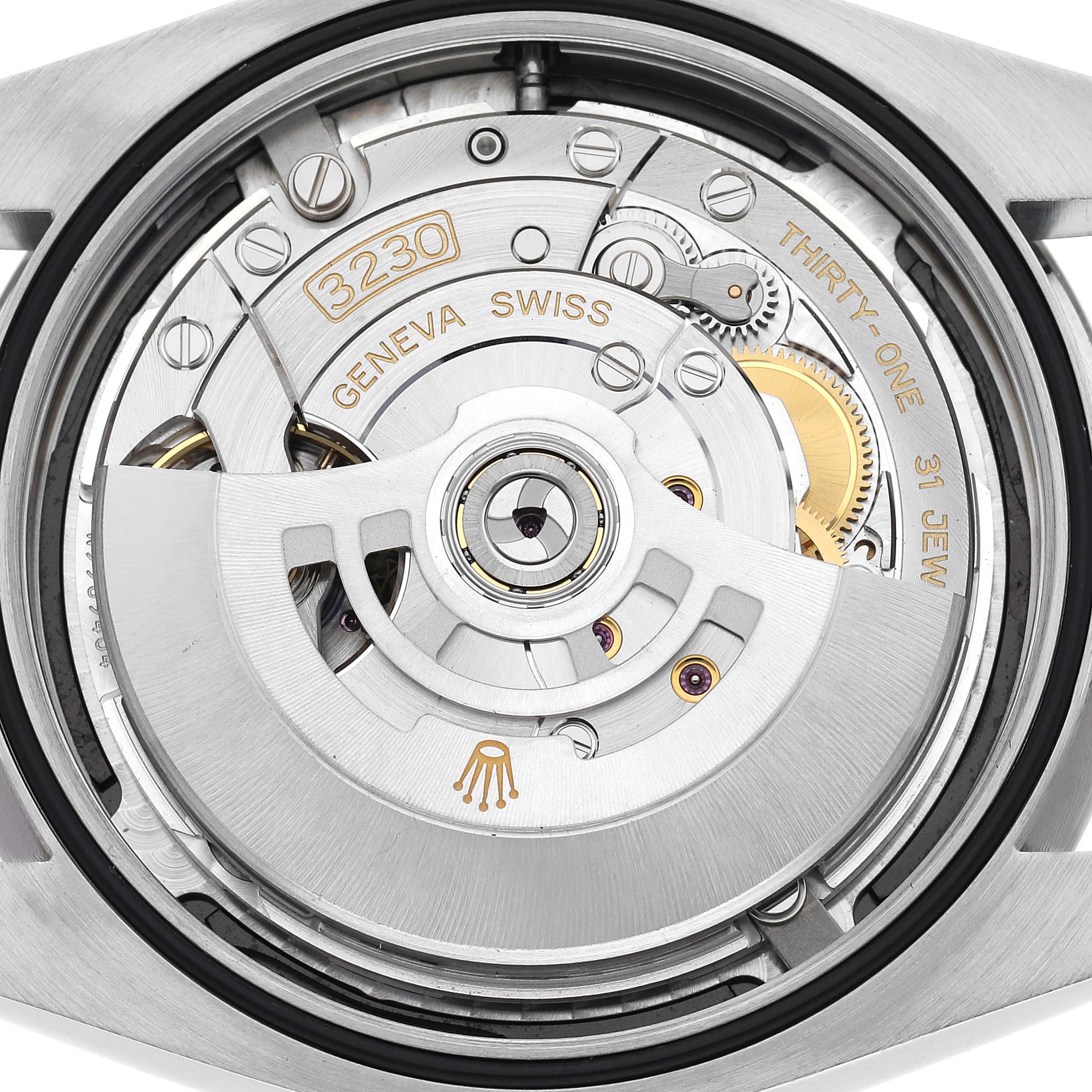 The image shows a close-up view of the movement mechanism from the back of a Rolex Oyster Perpetual model 124300 men's watch.
