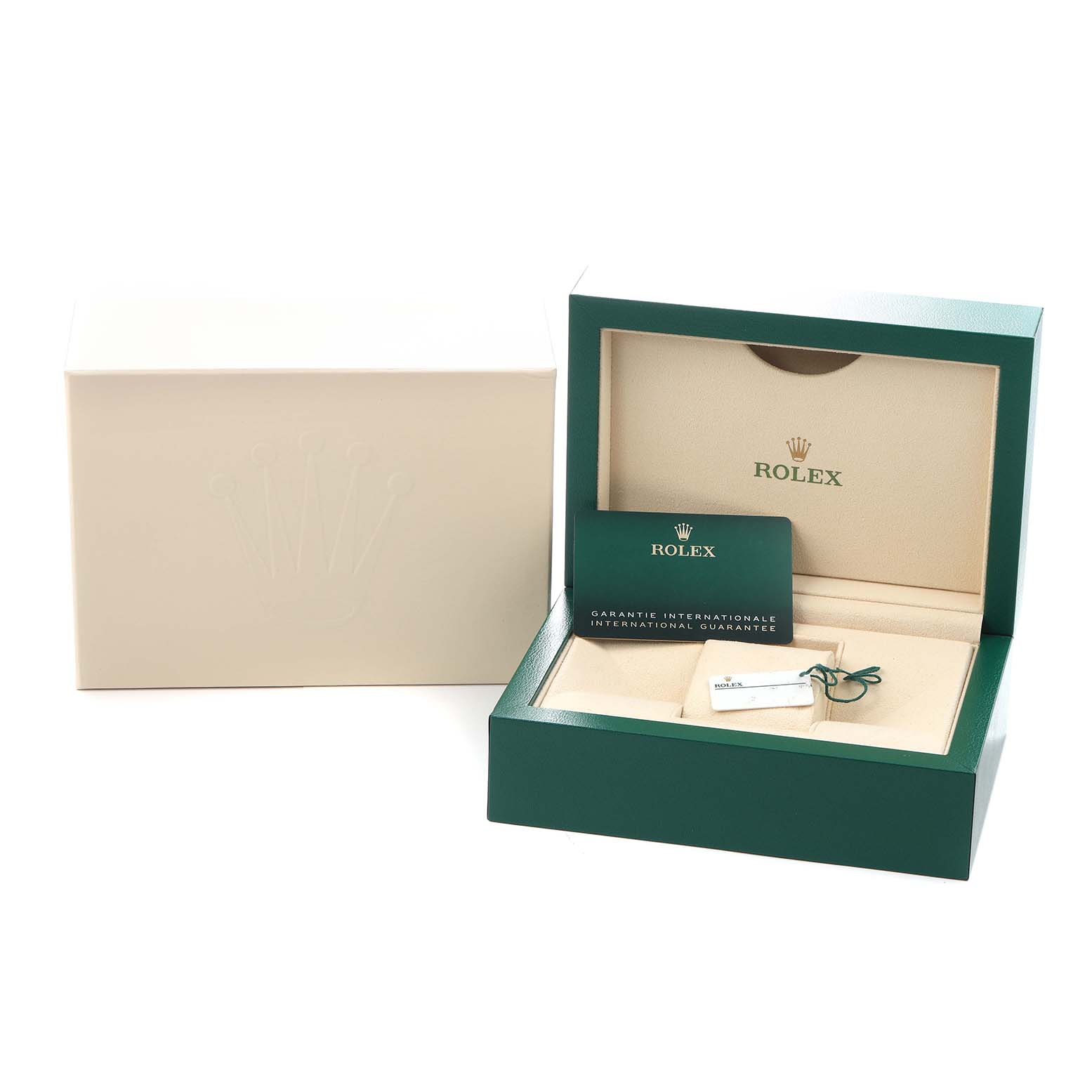 The image shows the box and accessories for a Rolex Oyster Perpetual Men's watch, model 124300, including a green case, guarantee card, and tag.