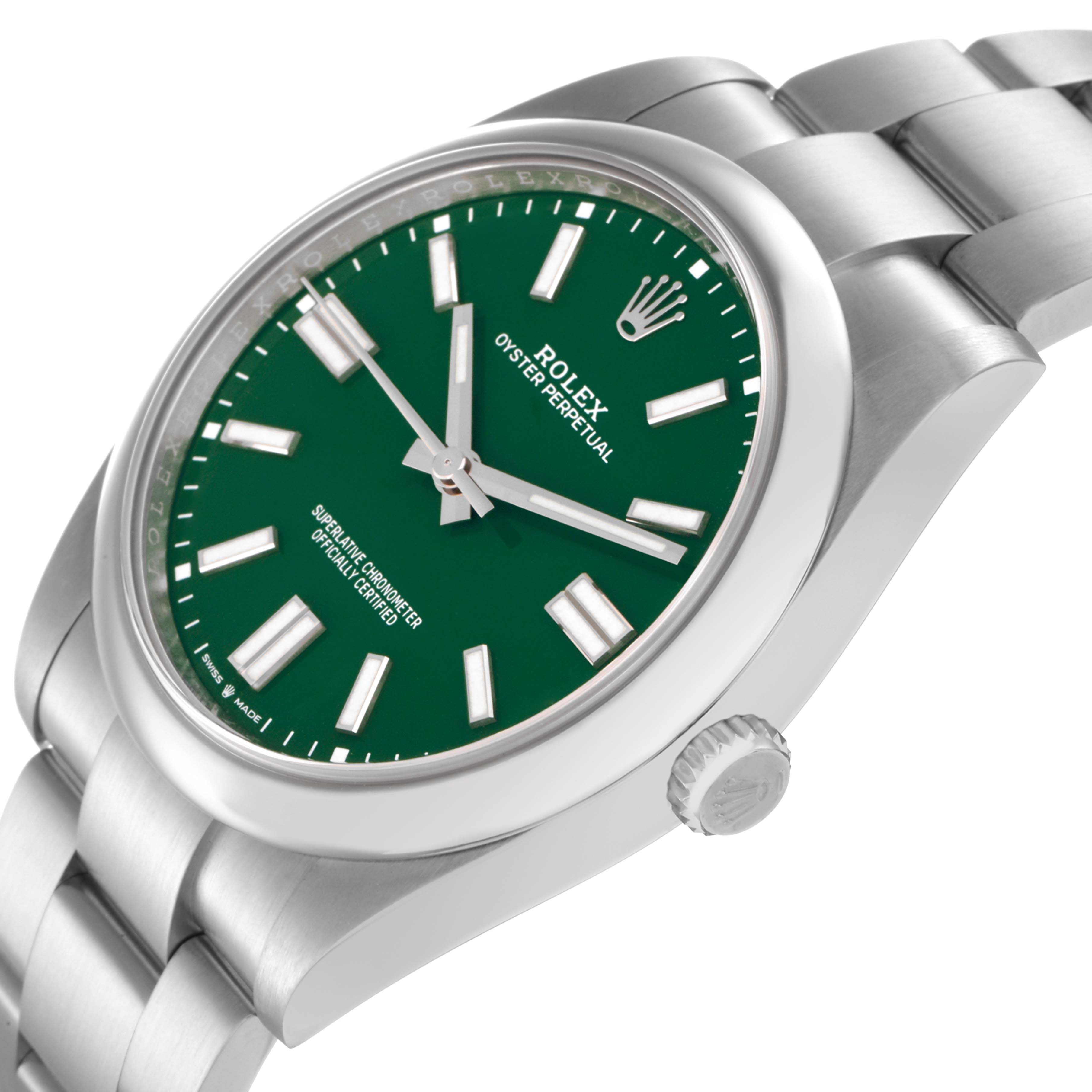 The image shows a Rolex Oyster Perpetual model 124300 men's watch from a three-quarter angle, highlighting the green dial, case, crown, and part of the bracelet.