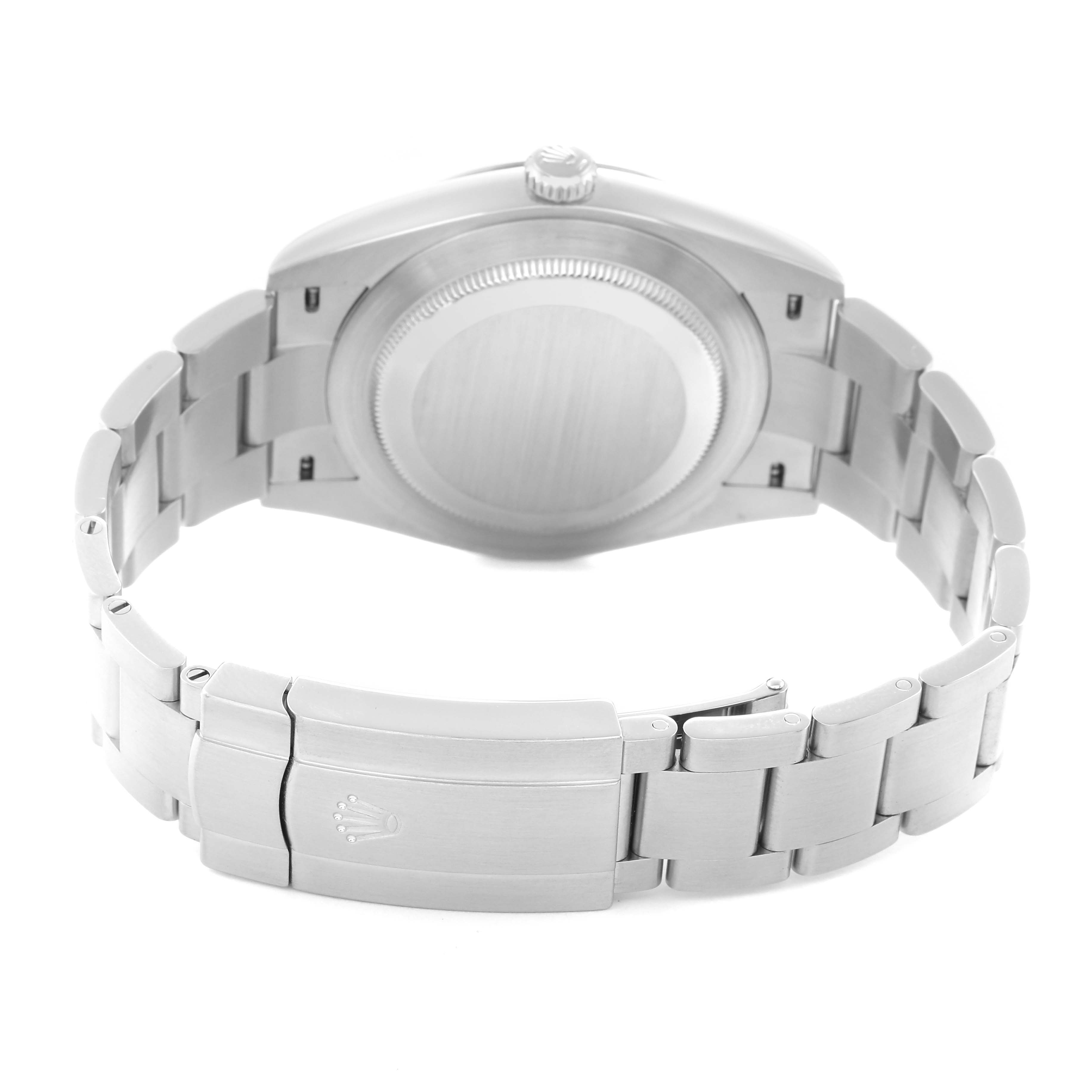 The Rolex Oyster Perpetual model 124300 is shown from the back, highlighting the case back, clasp, and bracelet.