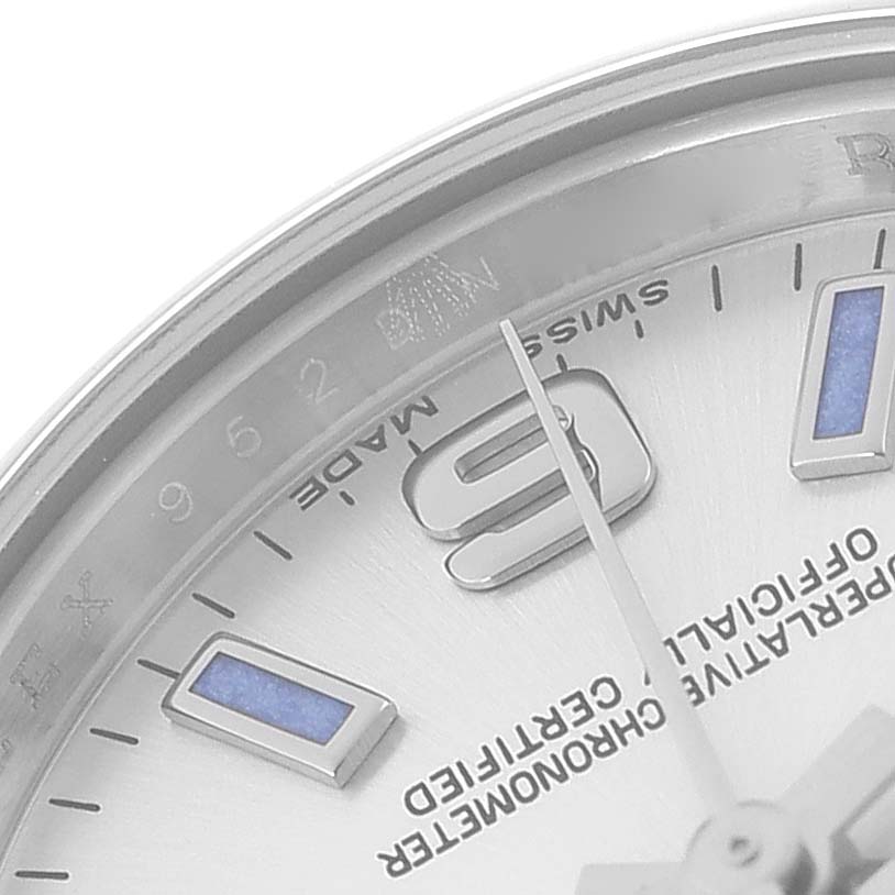 The image shows a close-up of the Rolex Oyster Perpetual model 176200 watch face, highlighting the hour markers and part of the minute and second hands.