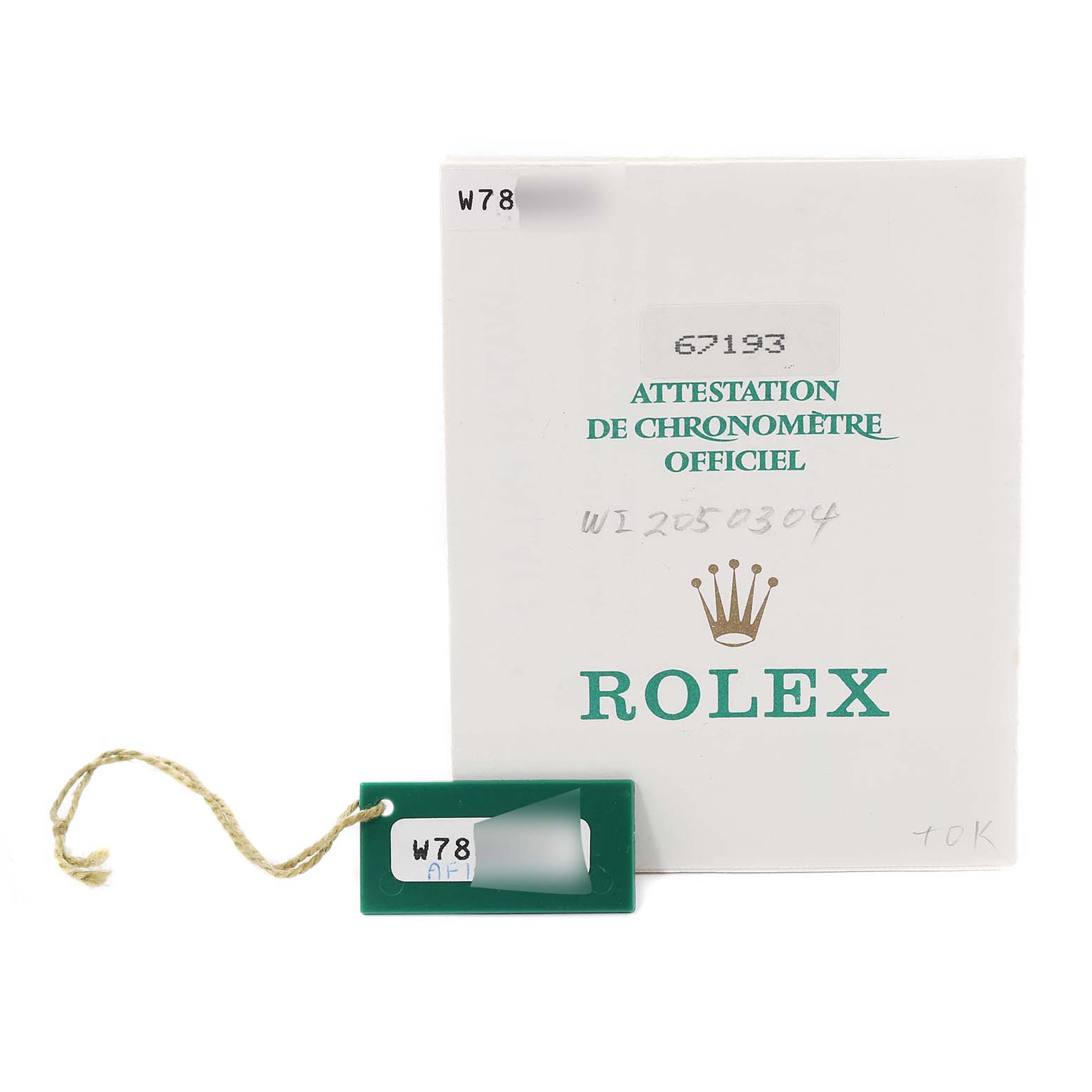 The image shows the authentication card and tag of a Rolex Oyster Perpetual 67193 Women's Steel and Gold (two tone) Champagne Dial 67193 Women's Steel and Gold (two tone) Champagne Dial watch.