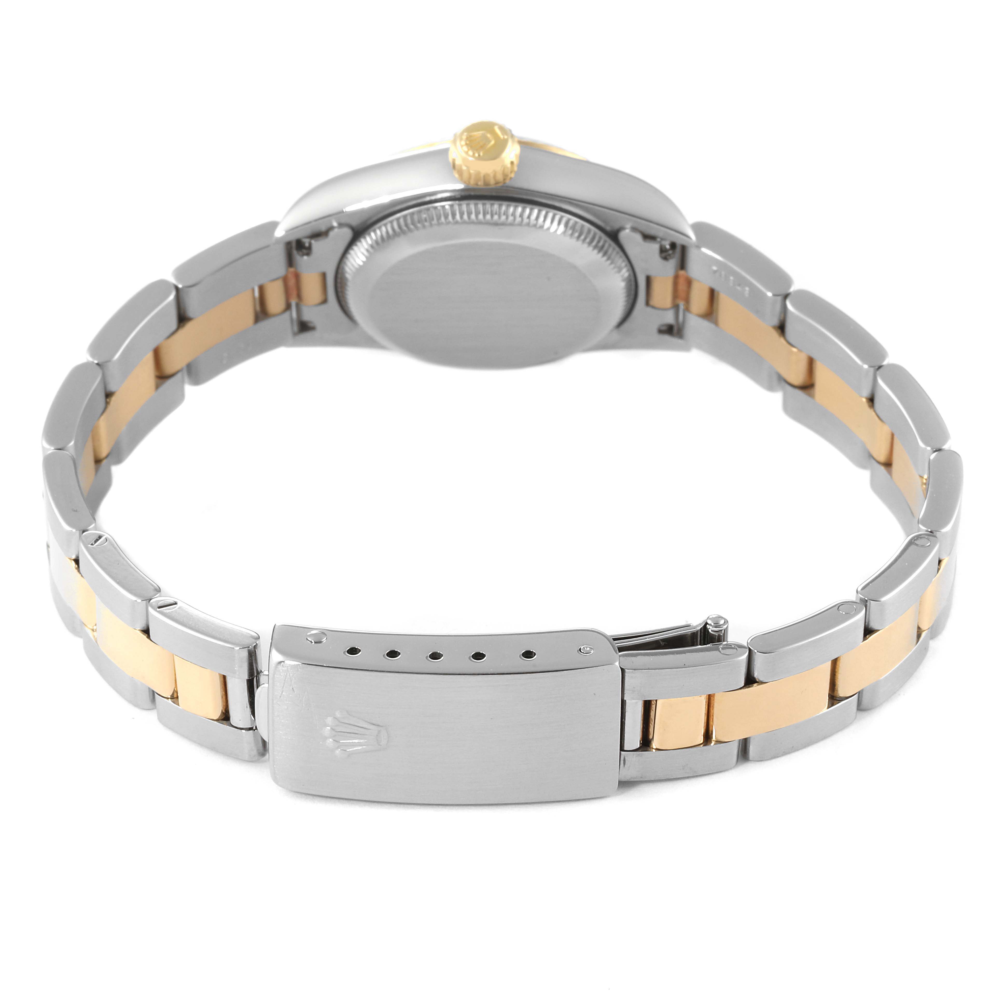 The image shows the back and bracelet of the Rolex Oyster Perpetual 67193 Women's Steel and Gold (two tone) Champagne Dial 67193 Women's Steel and Gold (two tone) Champagne Dial watch, highlighting its two-tone metal links and clasp.
