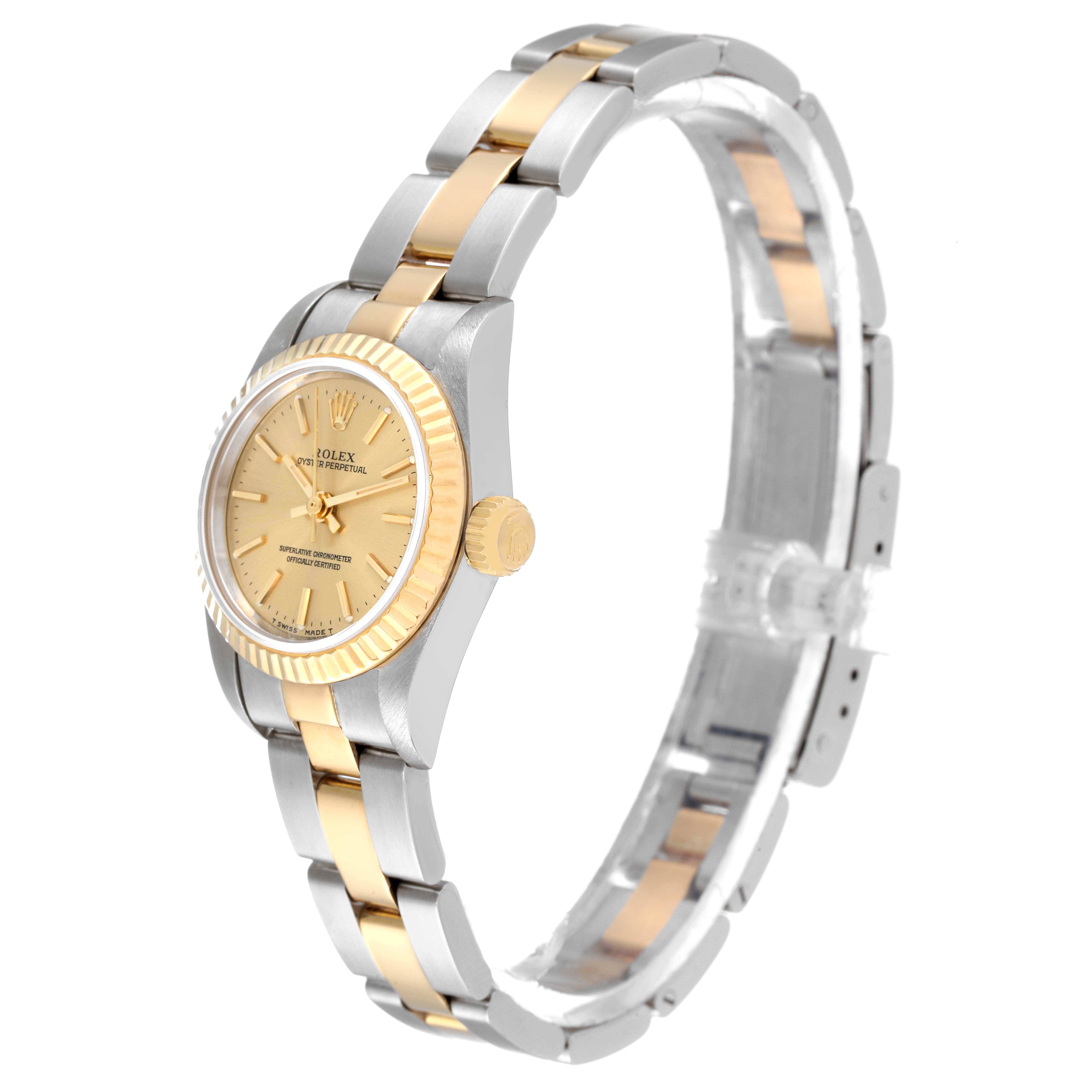 The image shows a Rolex Oyster Perpetual 67193 Women's Steel and Gold (two tone) Champagne Dial 67193 Women's Steel and Gold (two tone) Champagne Dial watch at a slight angle, highlighting its two-tone bracelet and gold dial with fluted bezel.