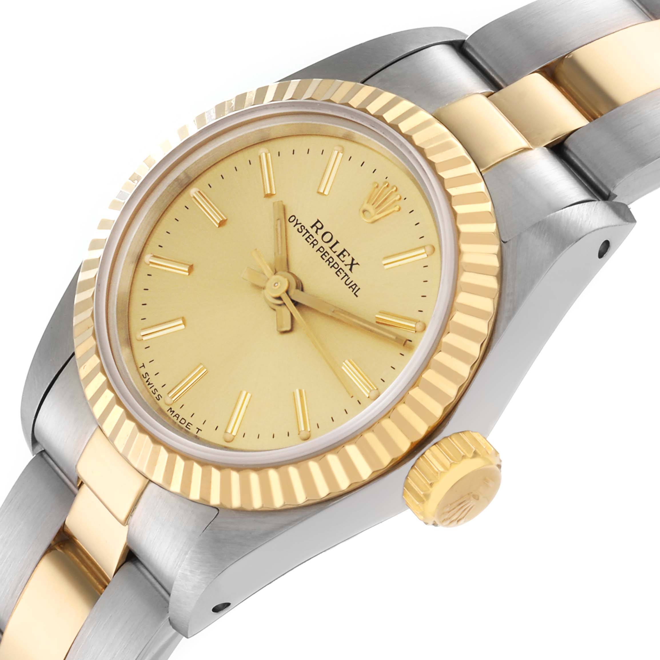 The Rolex Oyster Perpetual model 67193 is shown at an angled view, highlighting the gold dial, fluted bezel, crown, and two-tone bracelet.