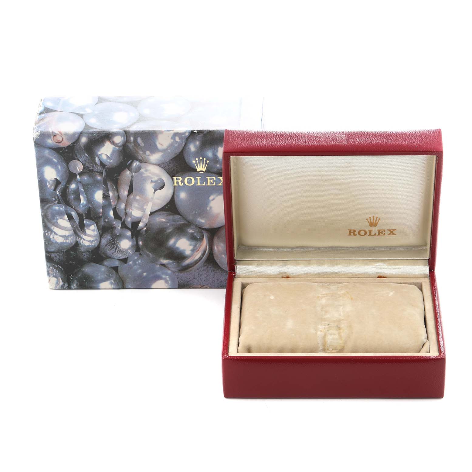 The image shows the packaging for a Rolex Oyster Perpetual model 67193 with an open red watch box and decorative exterior box.