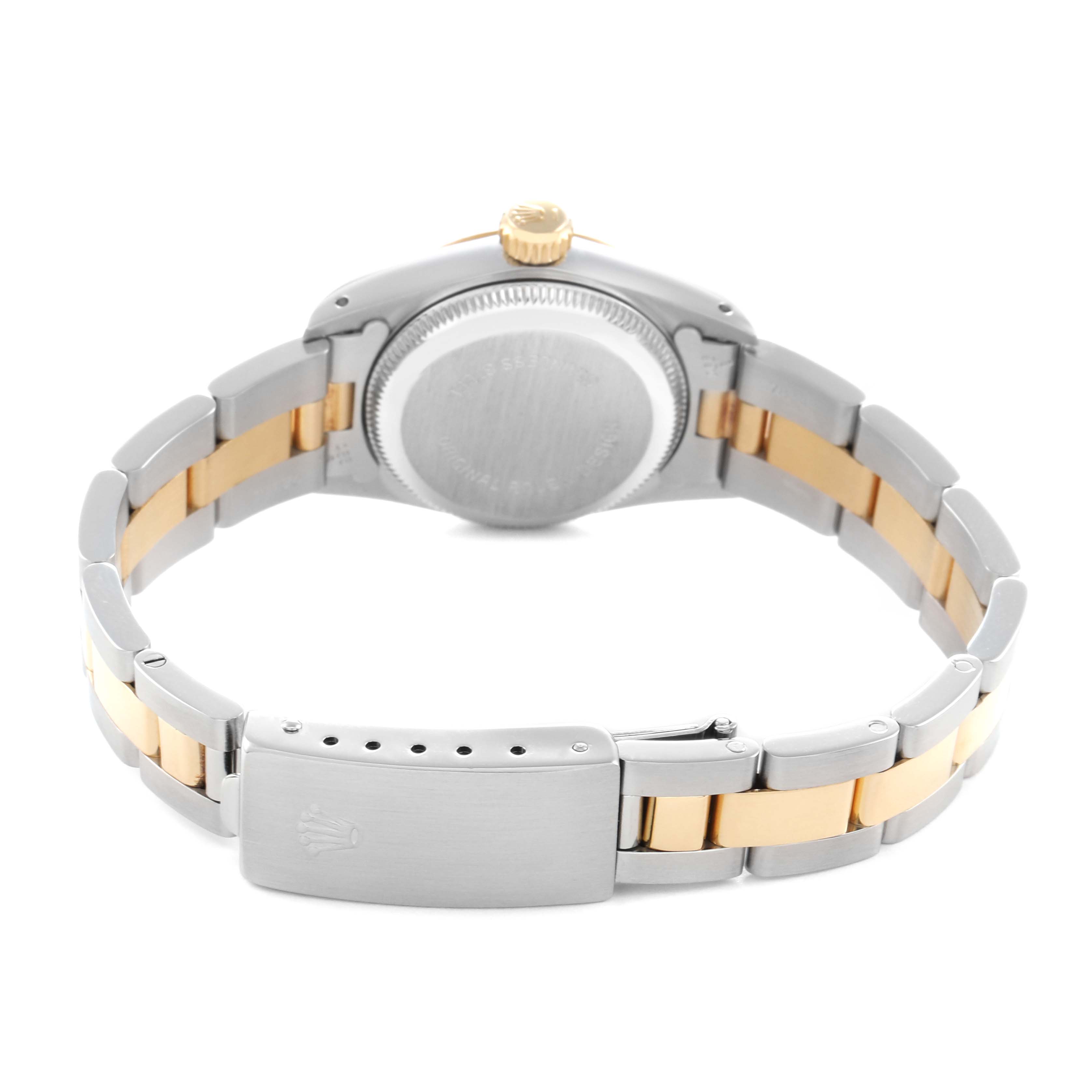 The image shows the back view of a Rolex Oyster Perpetual model 67193 men's watch, highlighting the clasp, bracelet, and case back.