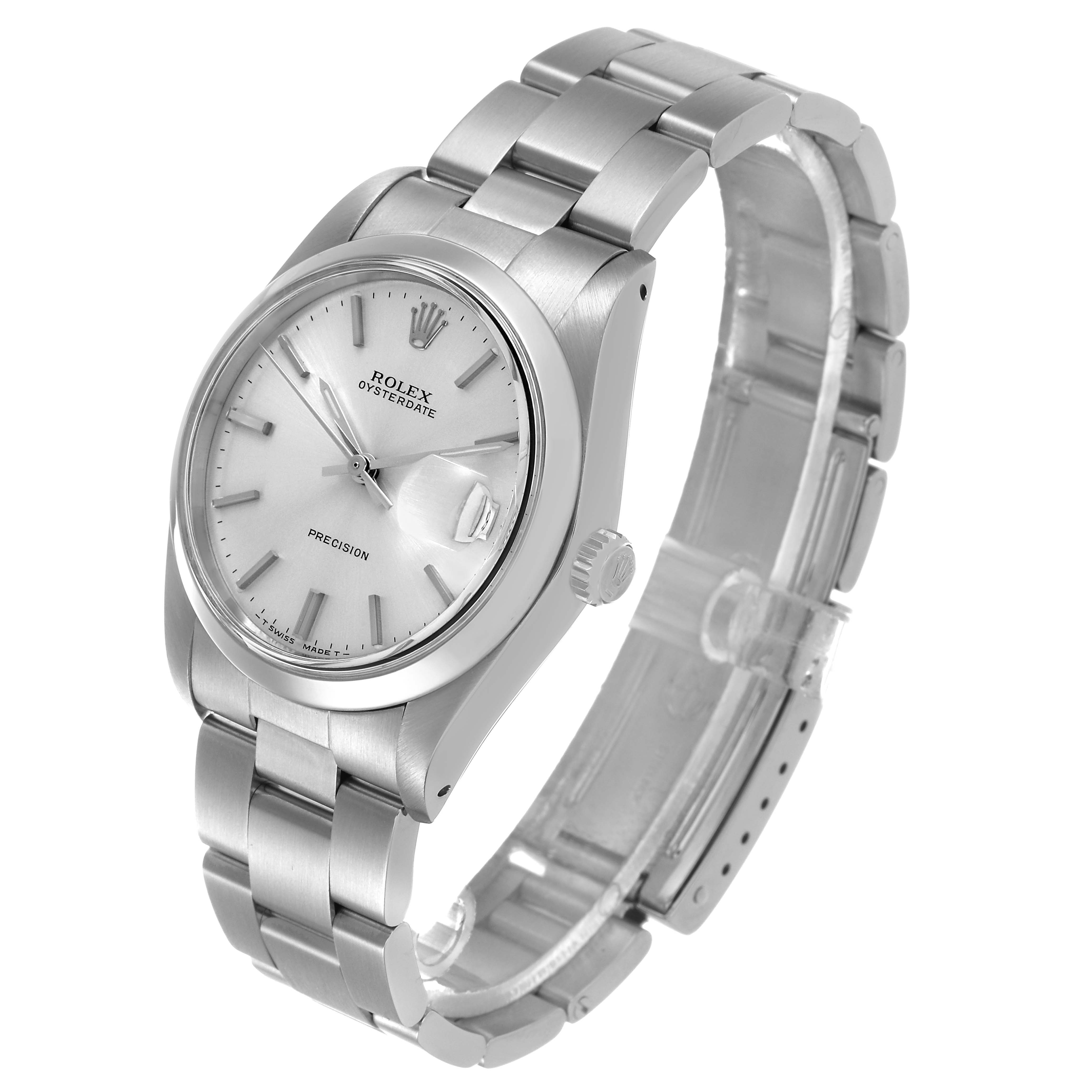 The Rolex Date 6694 Men's Stainless Steel Silver Dial watch is shown at an angled side view, highlighting the dial, bezel, crown, and bracelet.