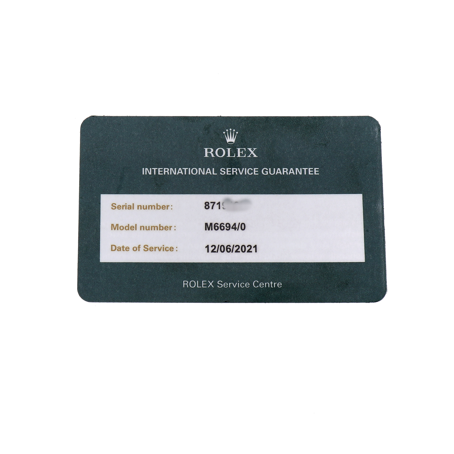 This image shows a Rolex International Service Guarantee card with serial and model numbers for a Rolex Date 6694 Men's Stainless Steel Silver Dial watch.
