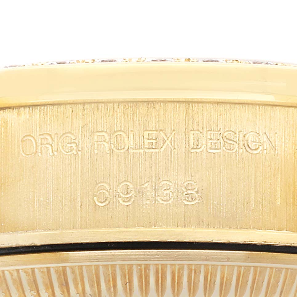 The image shows the side of a Rolex President model 69138 watch case, highlighting the engraved "ORIG ROLEX DESIGN" and model number.