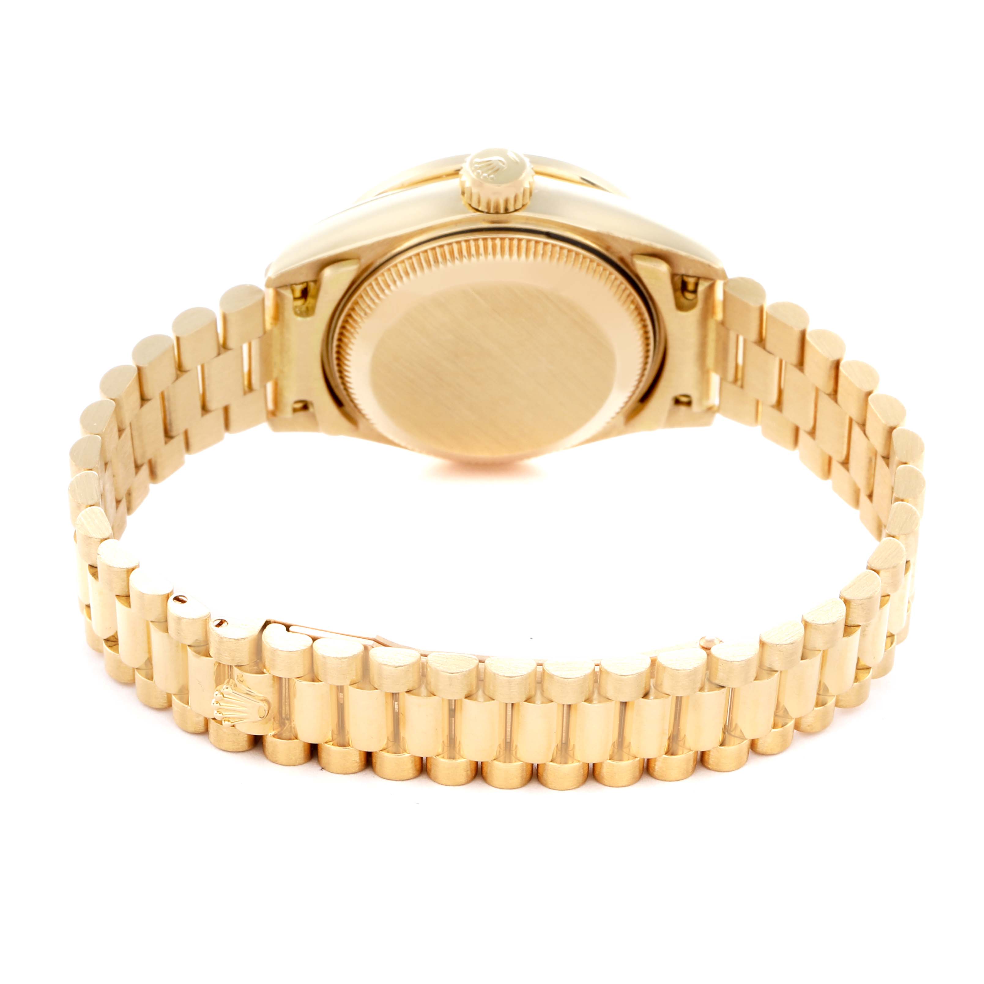 The image shows the back view of a Rolex President model 69138 men's watch, focusing on the case back, crown, and the President bracelet.