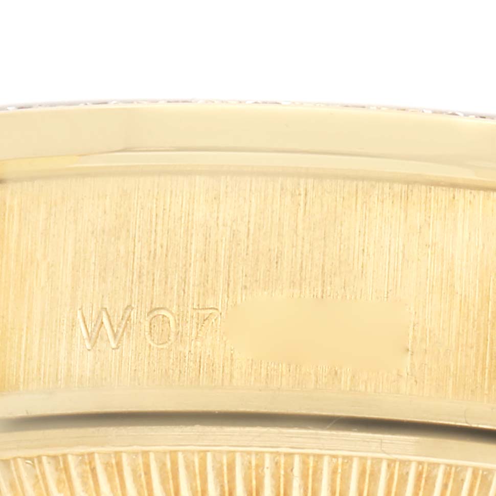 The image shows a close-up of the side of a Rolex President model watch, model number 69138, focusing on the watch's case and edge.