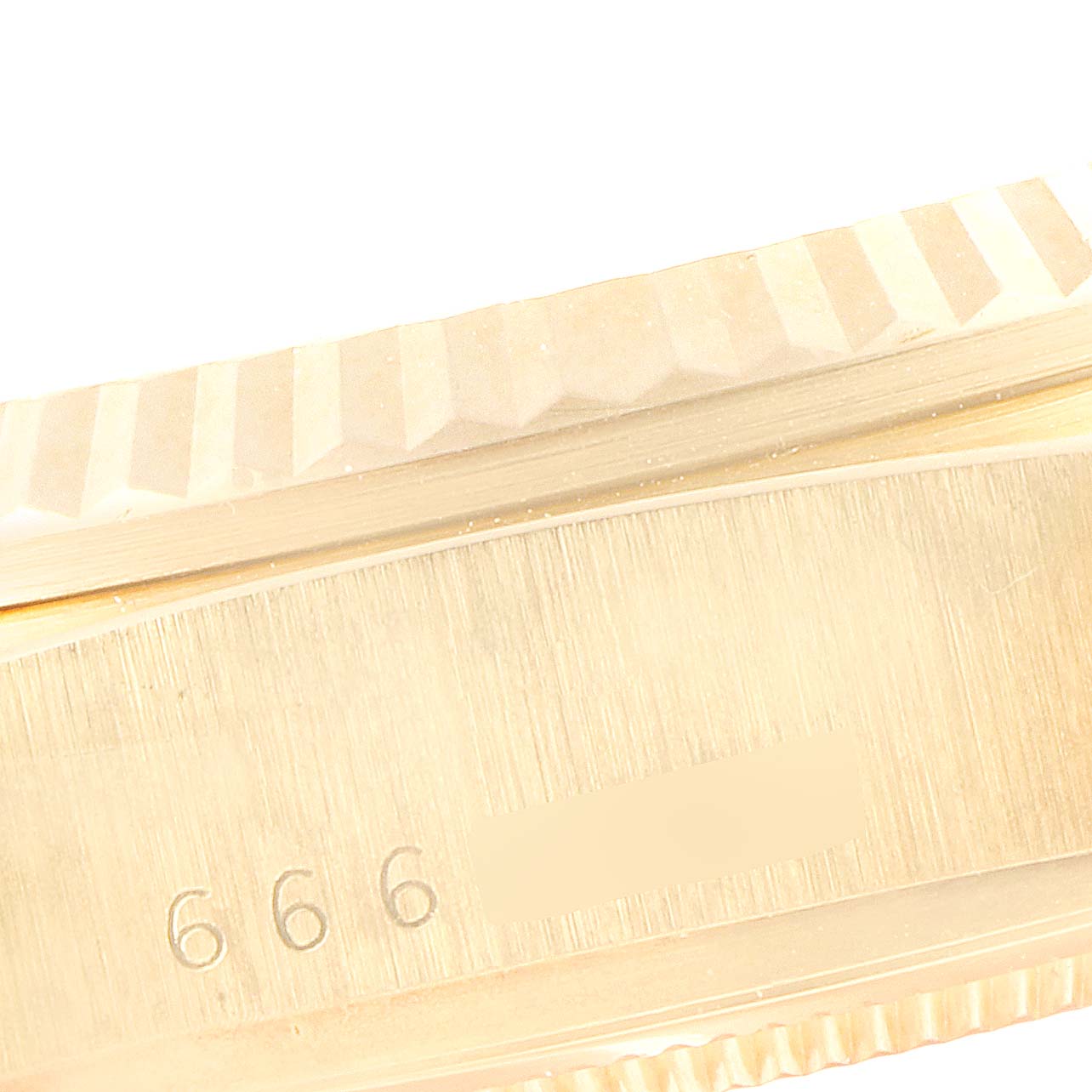 This image shows a close-up of the side case and bezel of a Rolex President 18038 Men
s Yellow Gold Champagne Dial 18038 Men
s Yellow Gold Champagne Dial model watch.