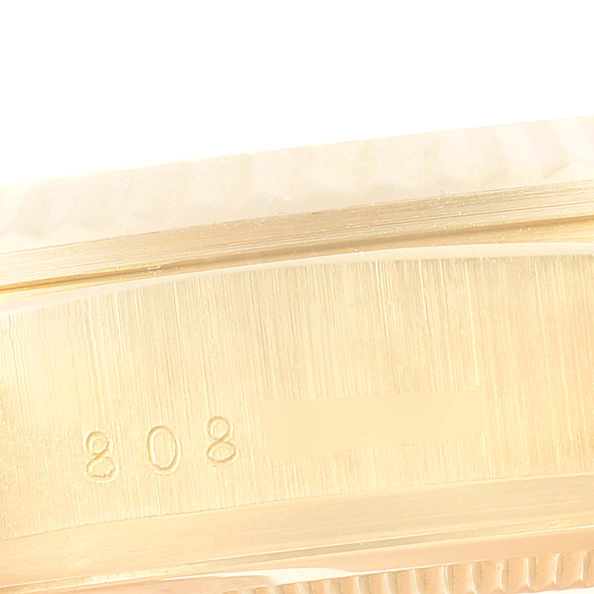 The image shows a close-up angle of the case side and fluted bezel of a Rolex President 18038 Men's Yellow Gold Champagne Dial 18038 Men's Yellow Gold Champagne Dial model watch, highlighting the engraved model number.