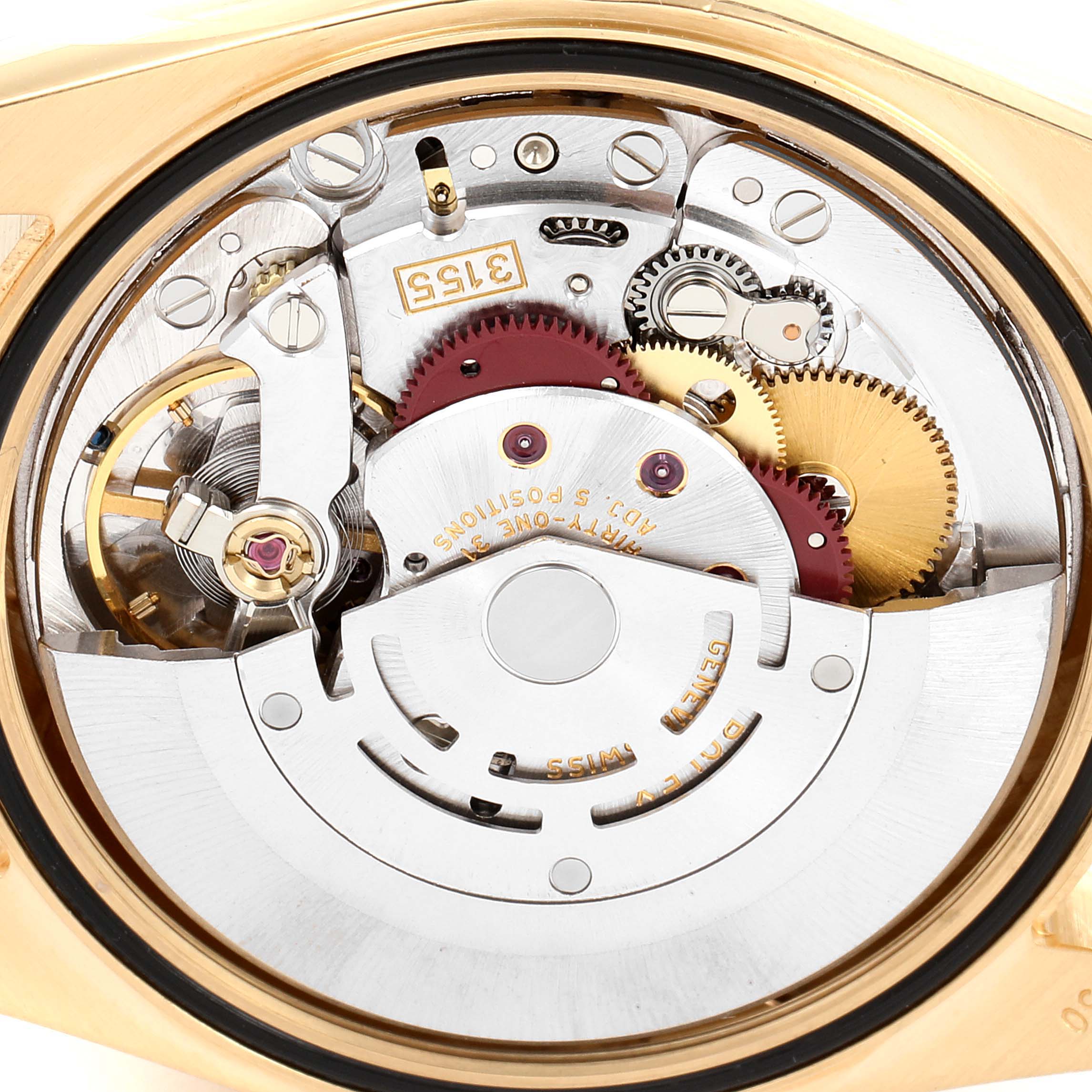 This is an internal view of the Rolex President 118238 Men
s Yellow Gold Black Dial 118238 Men
s Yellow Gold Black Dial model watch, showcasing its intricate movement components.