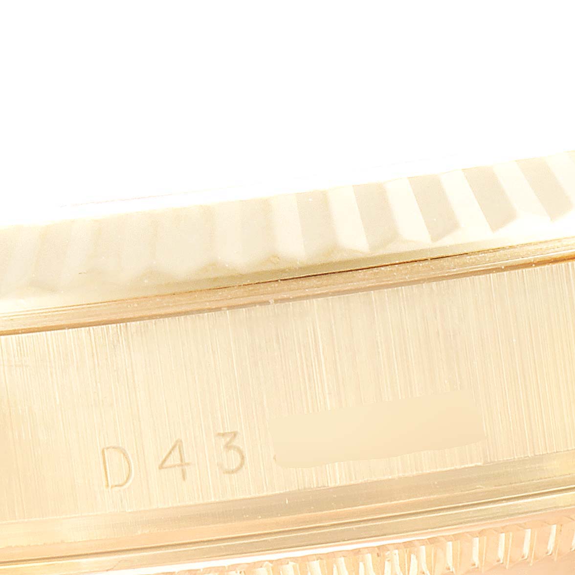 This image shows a close-up of the case side with the serial number on a Rolex President 118238 Men
s Yellow Gold Black Dial 118238 Men
s Yellow Gold Black Dial model watch.