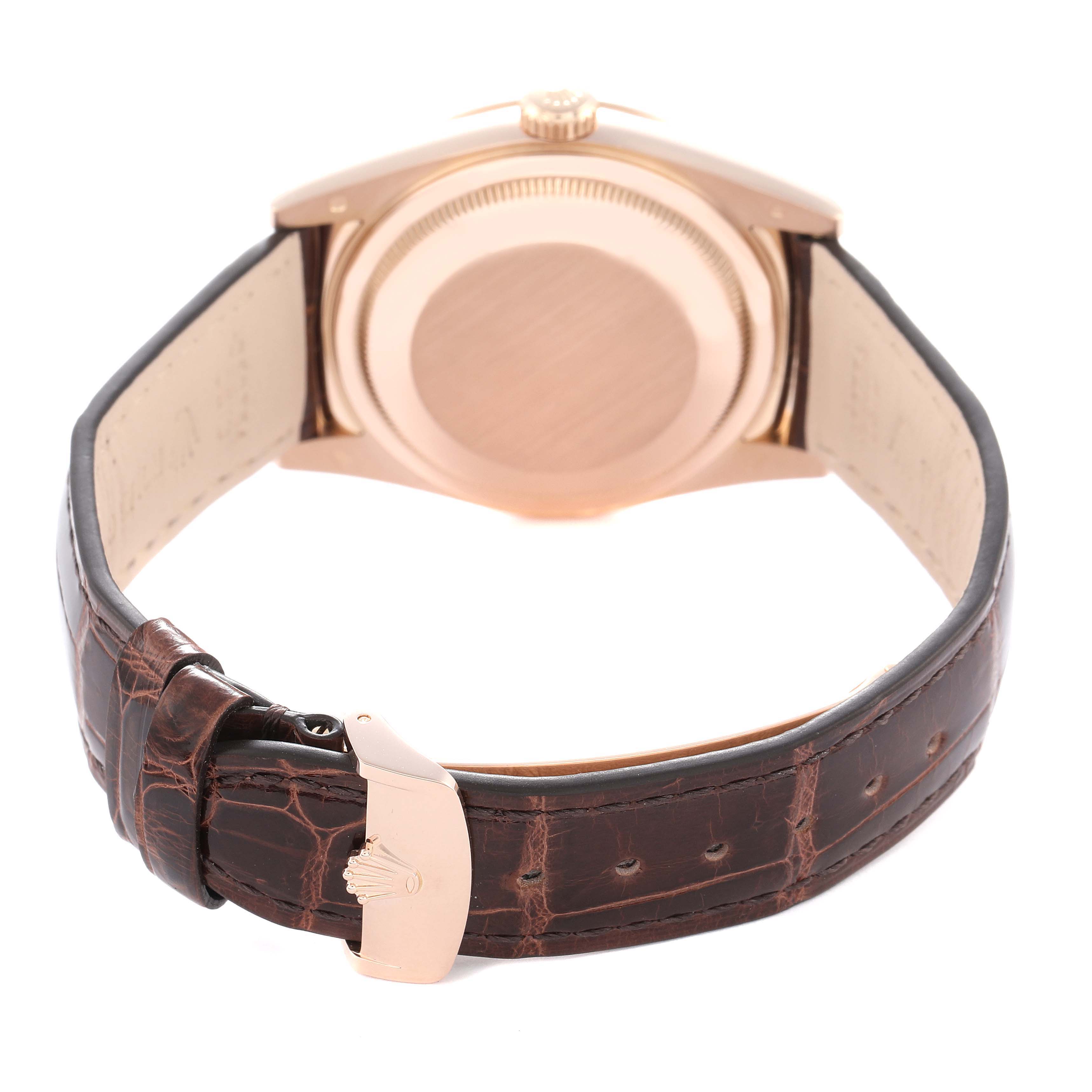 The image shows a Rolex President model 118135 from the back, highlighting the case back and leather strap with the clasp visible.