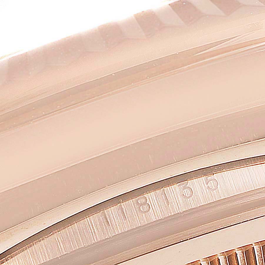The image shows a close-up of the side of the Rolex President model 118135, highlighting its bezel and case details.
