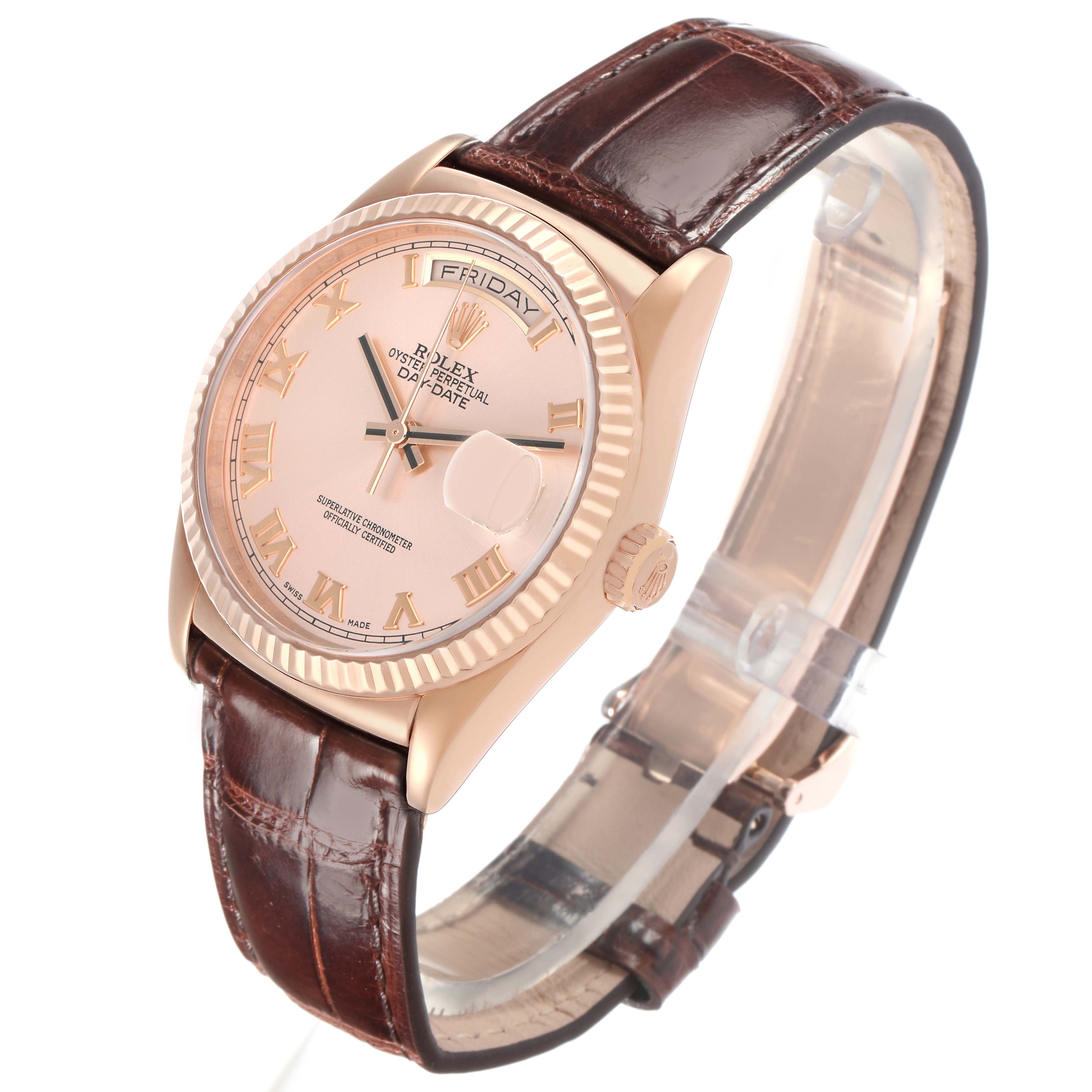 The Rolex President model 118135 is shown at an angle displaying its dial, fluted bezel, crown, and brown leather strap.