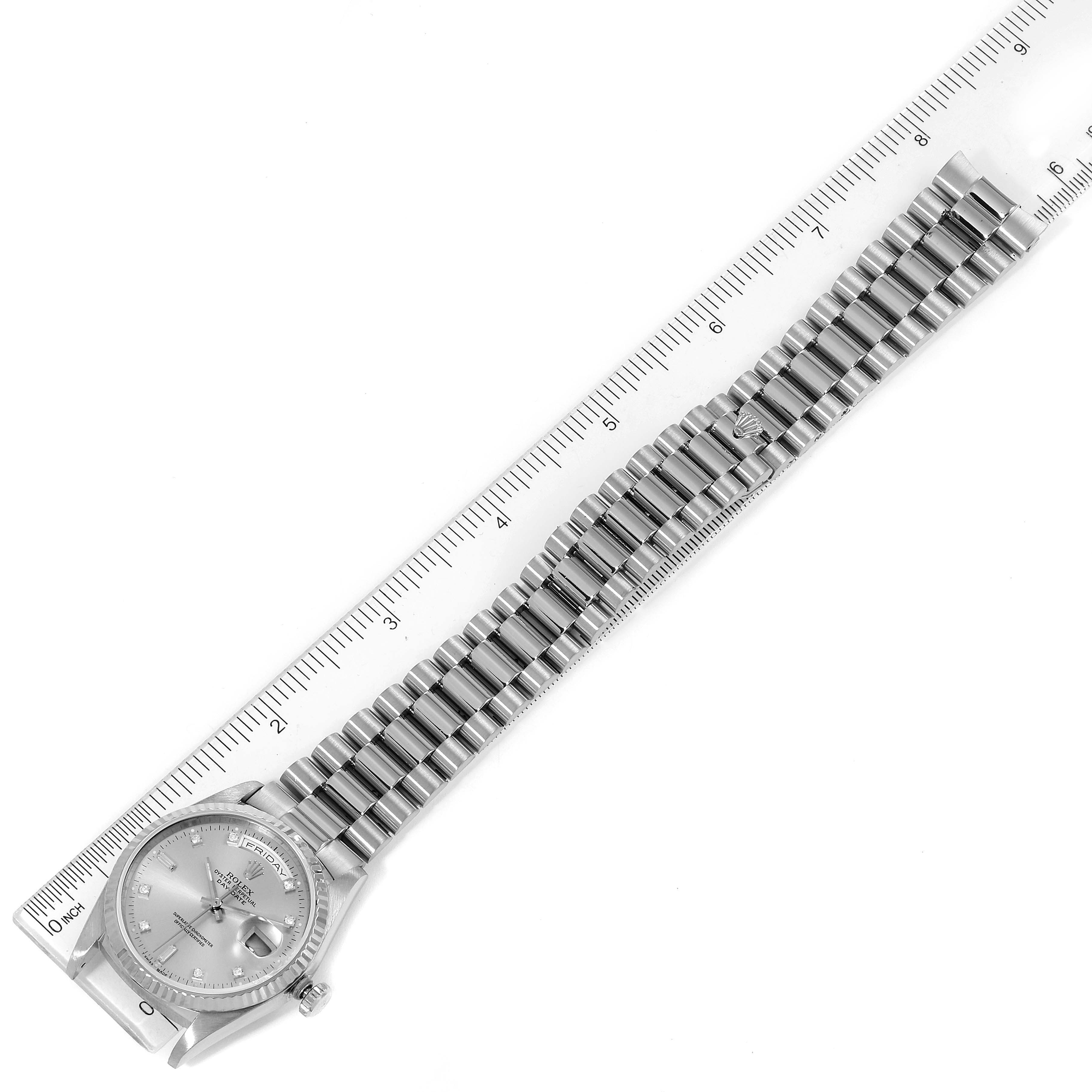 The image shows the face and full band of a Rolex President 18239 Men's White Gold Silver Dial 18239 Men's White Gold Silver Dial model watch, with a ruler for size reference.