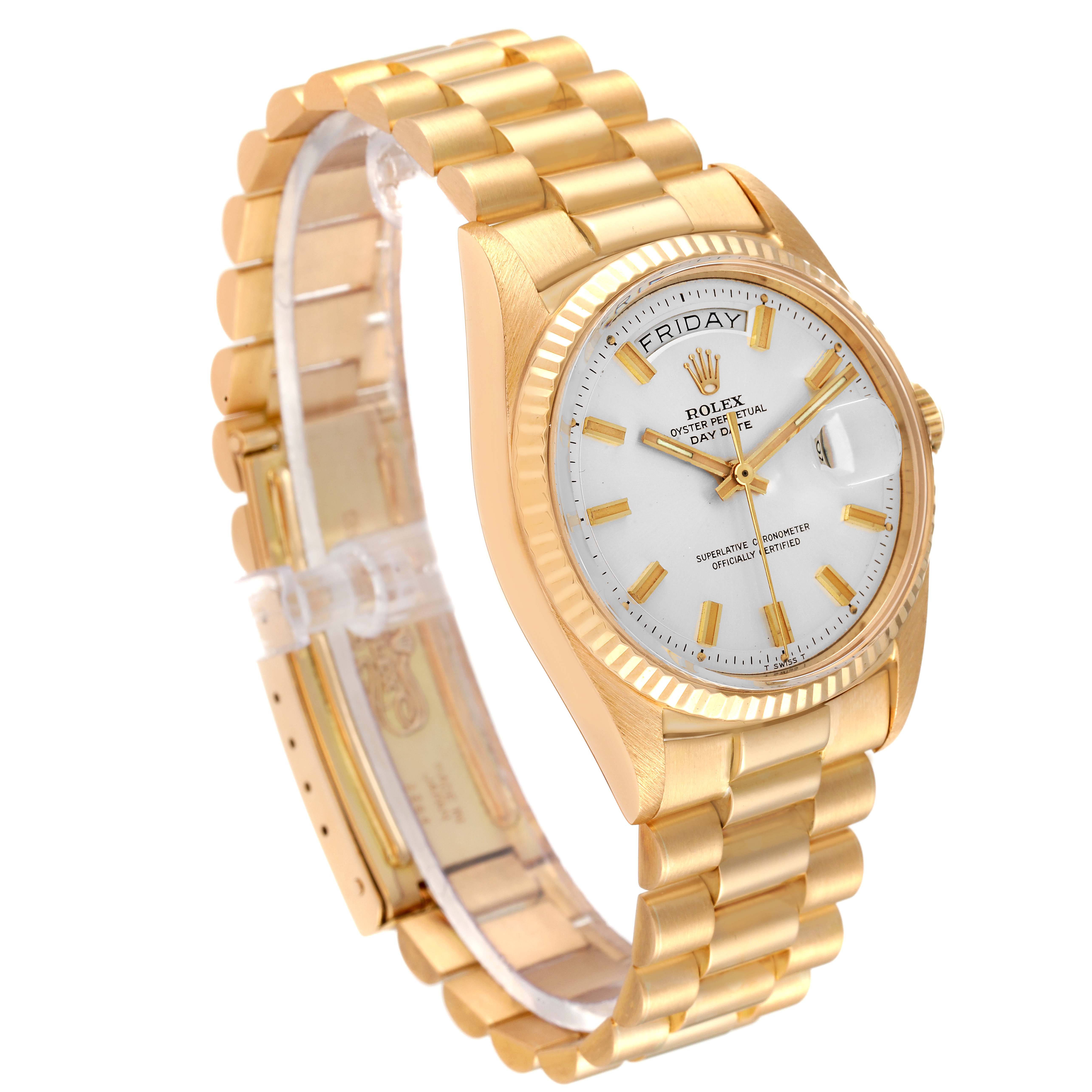 The Vintage Collection Rolex watch is shown at a three-quarter angle, highlighting its gold bracelet, case, and white dial.