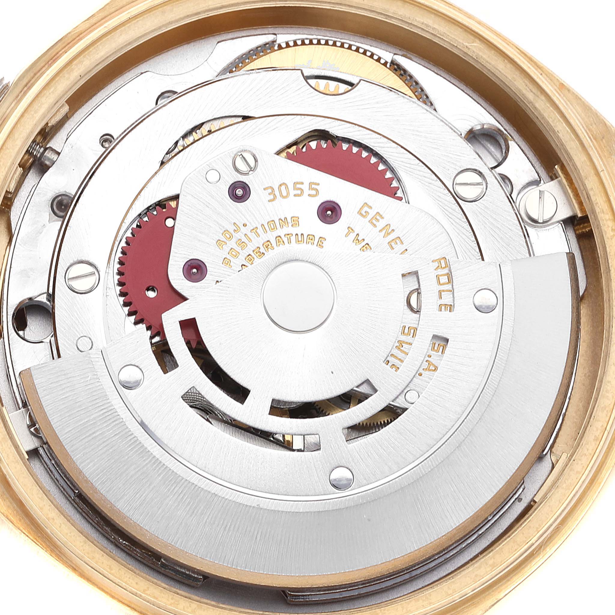 The image shows the internal mechanism of a Rolex President 18038 Men
s Yellow Gold Champagne Dial 18038 Men
s Yellow Gold Champagne Dial model watch from a top-down angle, highlighting the movement and cogs.